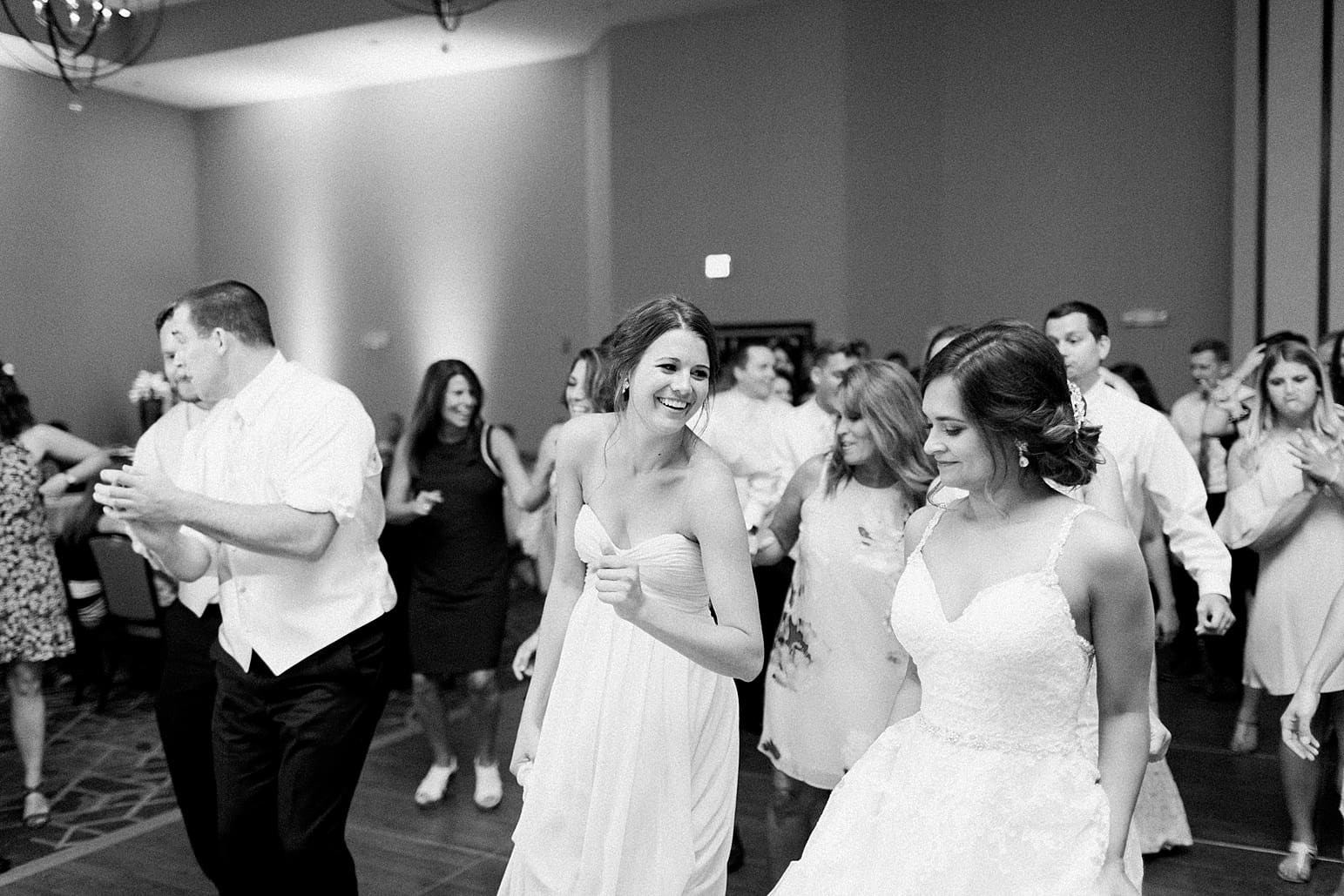 Arielle Peters Photography | Bride dancing at wedding reception at the Holiday Inn in Mishawaka, Indiana.