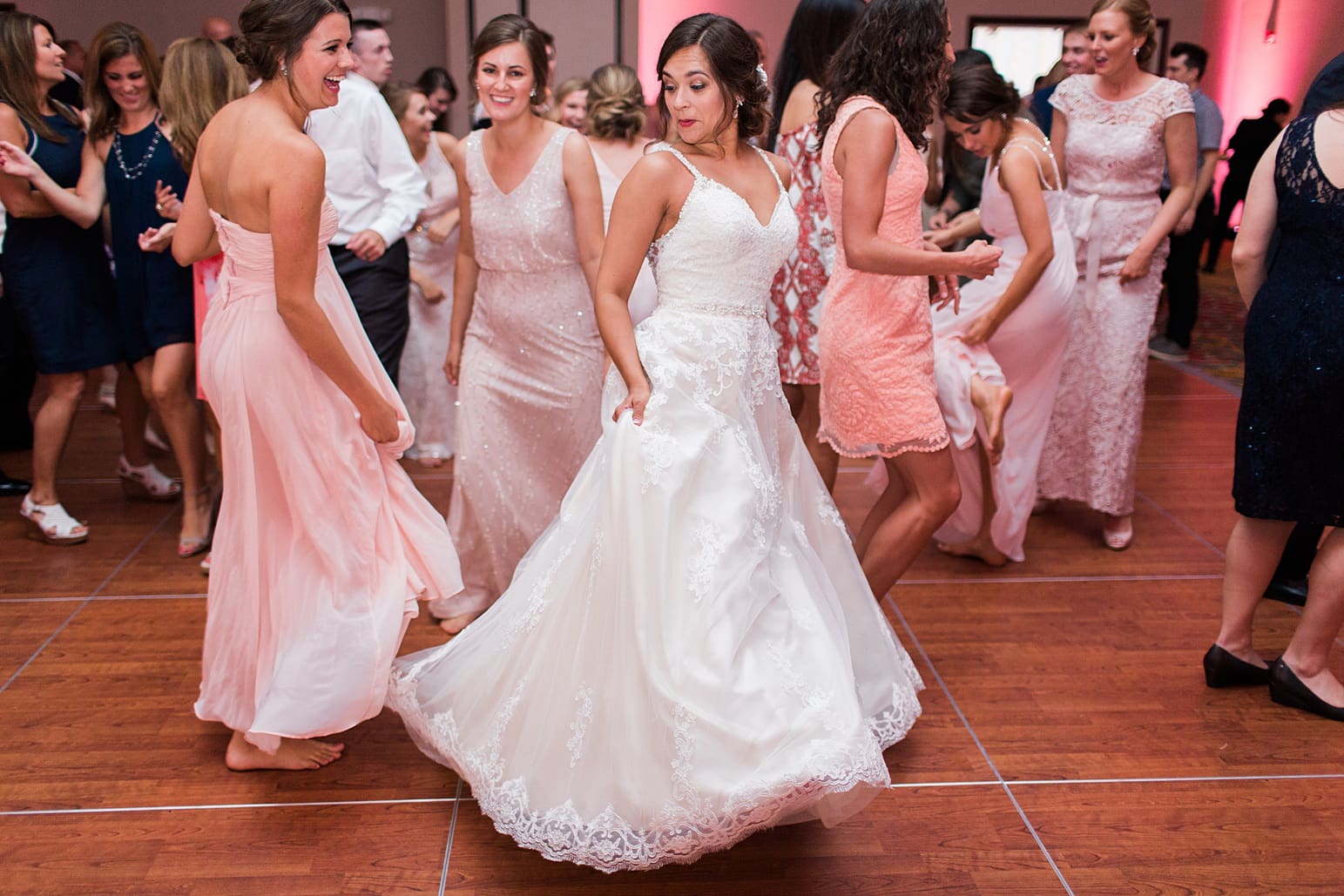 Arielle Peters Photography | Bride dancing at wedding reception at the Holiday Inn in Mishawaka, Indiana.