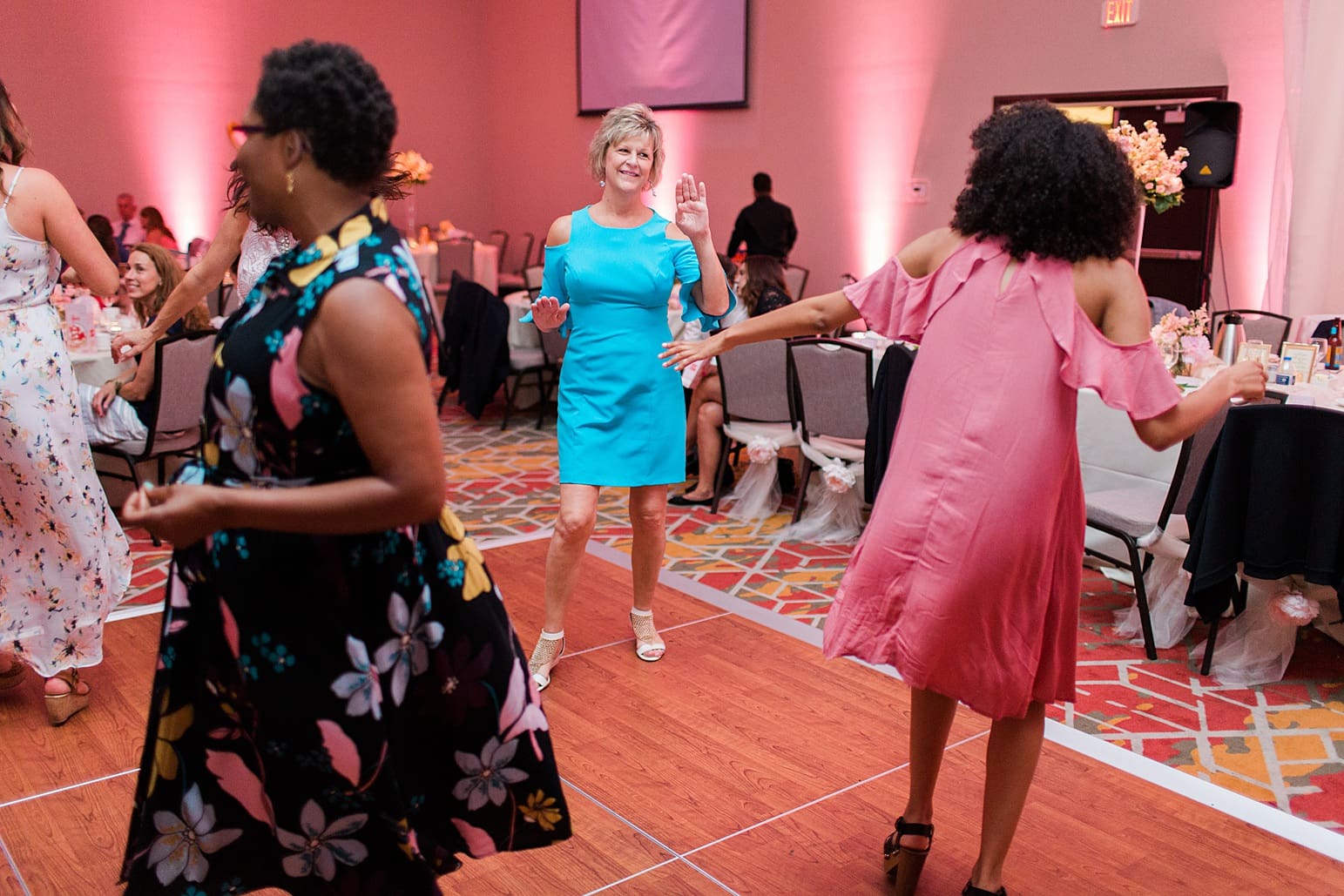 Arielle Peters Photography | Wedding guests dancing at wedding reception at the Holiday Inn in Mishawaka, Indiana.