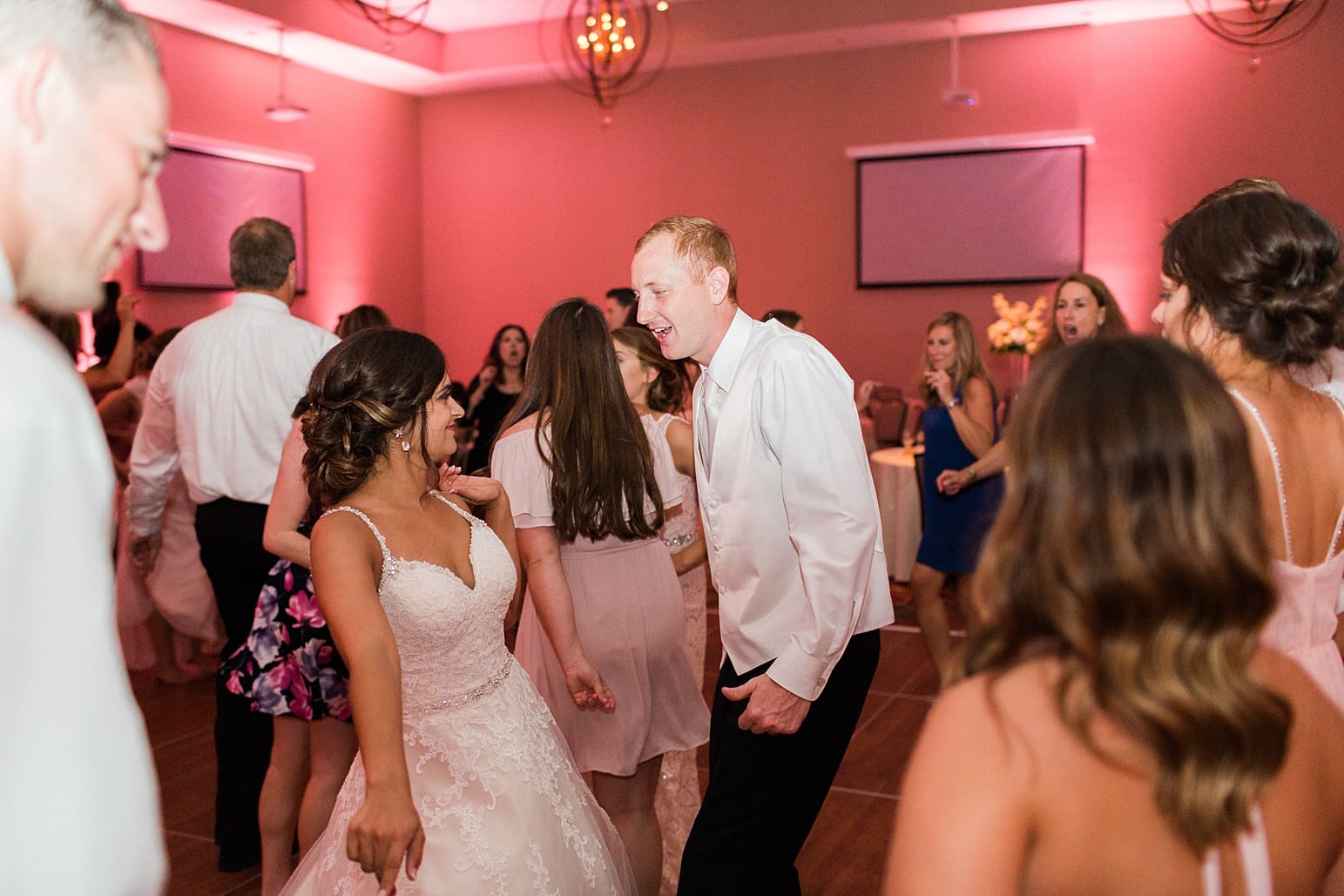 Arielle Peters Photography | Bride and groom dancing at wedding reception at the Holiday Inn in Mishawaka, Indiana.