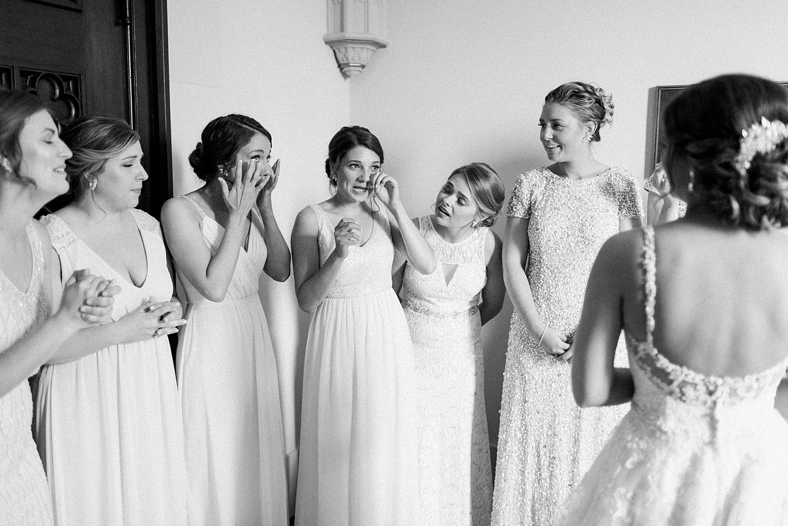 Arielle Peters Photography | Bride and bridesmaids having first reveal on wedding day at First United Methodist Church in Mishawaka, Indiana.