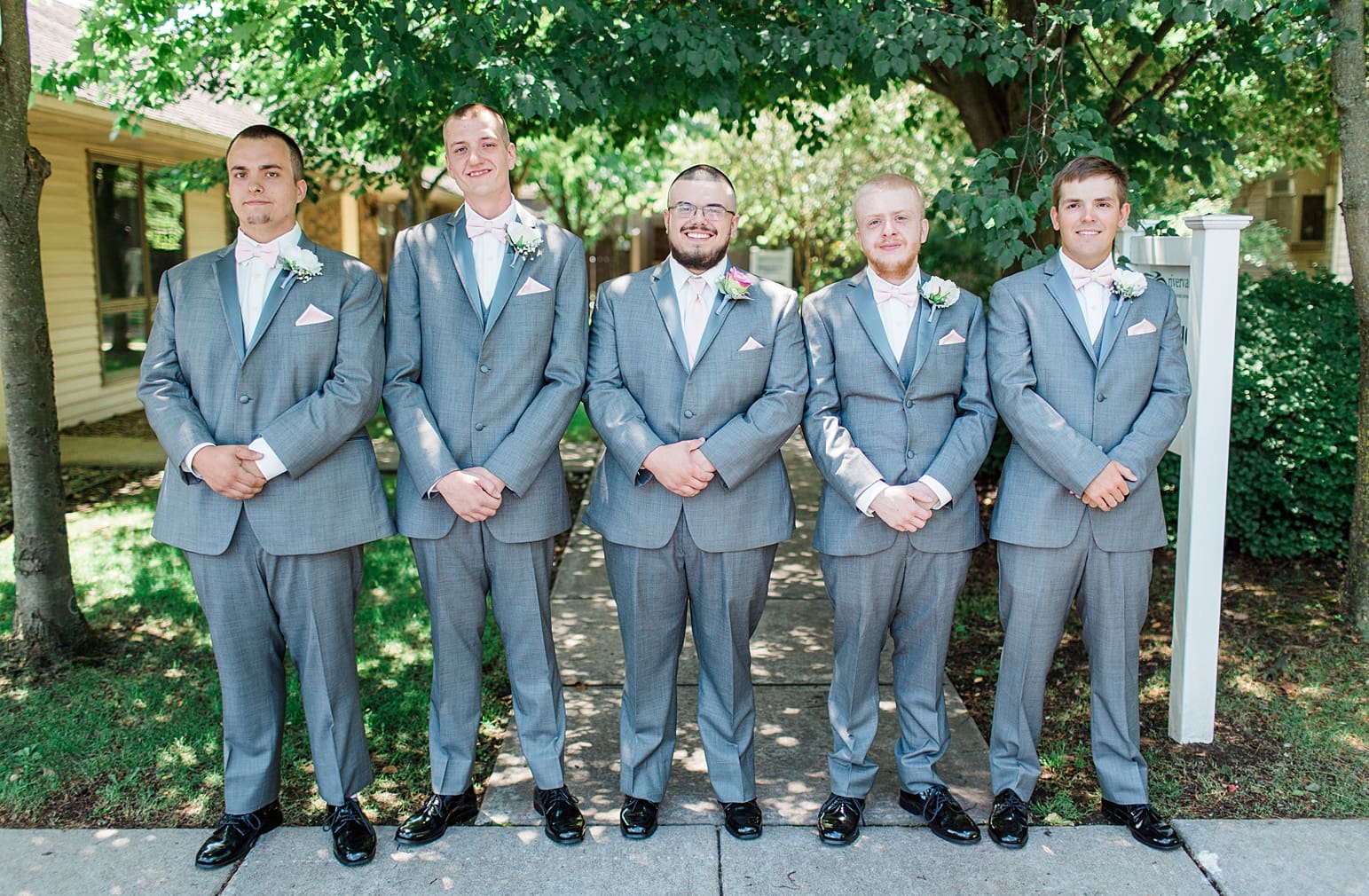 Arielle Peters Photography | Groom and groomsmen outside on wedding day at St. Joseph County Parks in South Bend, Indiana.