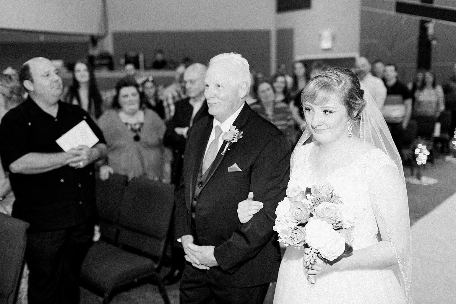 Arielle Peters Photography | Father of bride walking bride down aisle on wedding day at St. Joseph County Parks in South Bend, Indiana.