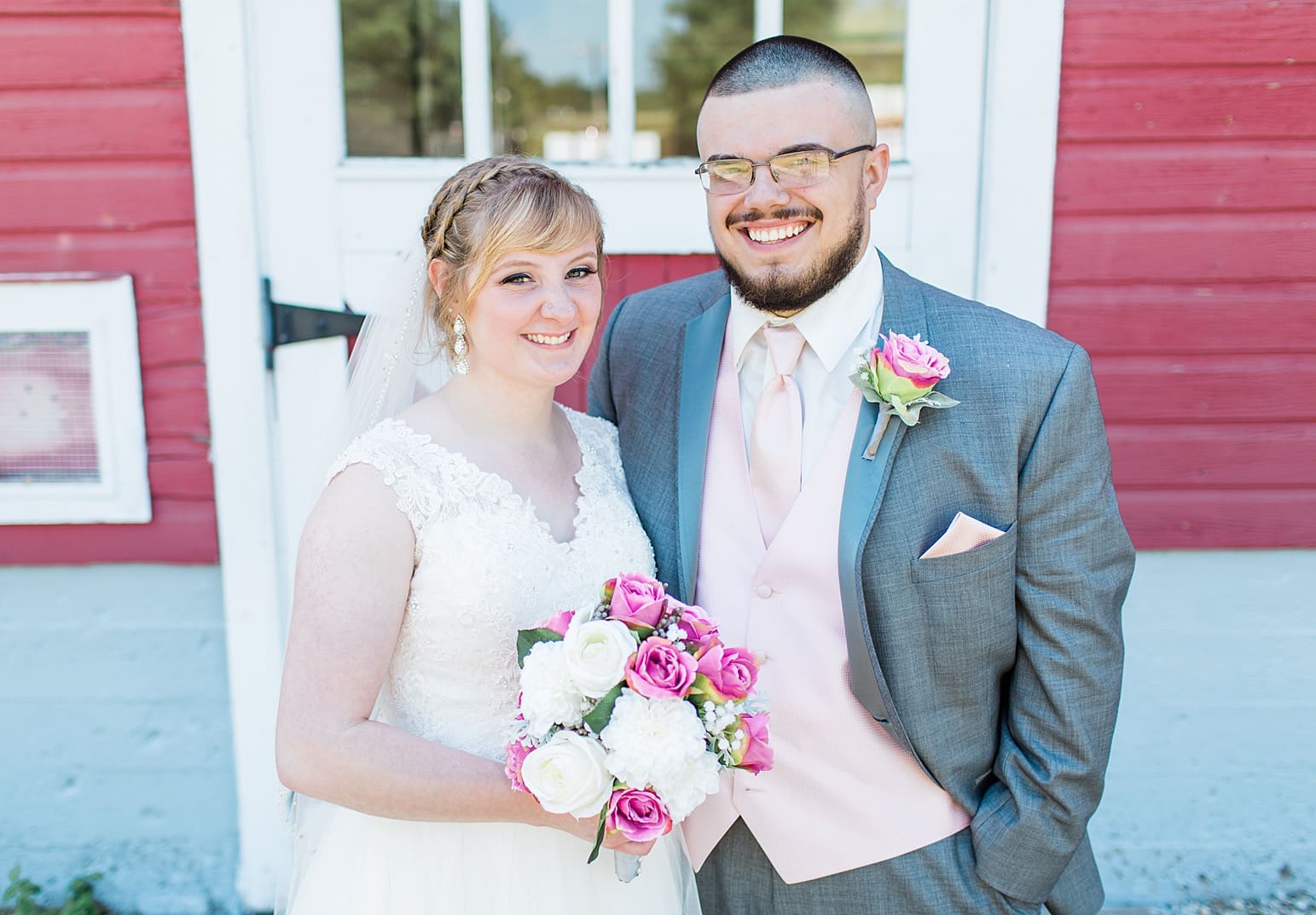 Arielle Peters Photography | Bride and groom next to old red barn on wedding day at St. Joseph County Parks in South Bend, Indiana.