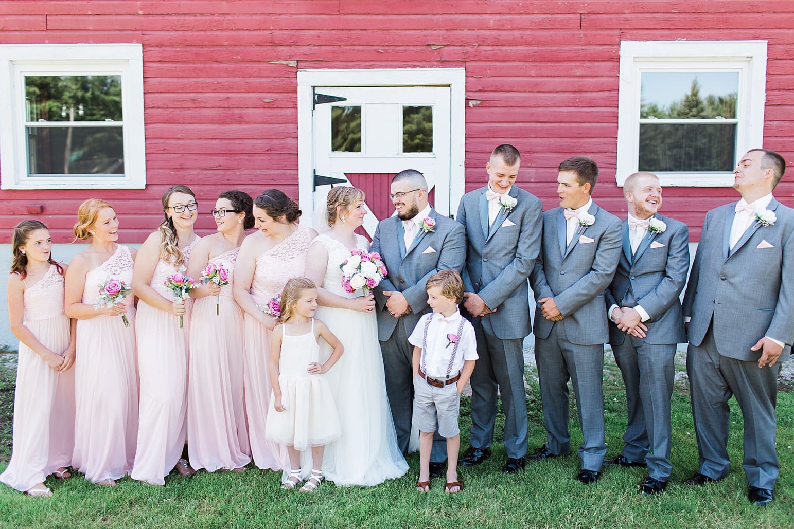 Arielle Peters Photography | Wedding party next to old red barn on wedding day at St. Joseph County Parks in South Bend, Indiana.