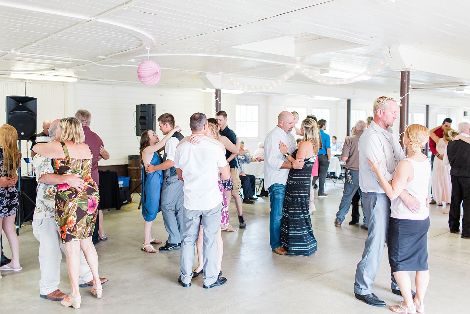 Arielle Peters Photography | Wedding guests slow dancing on wedding day at St. Joseph County Parks in South Bend, Indiana.