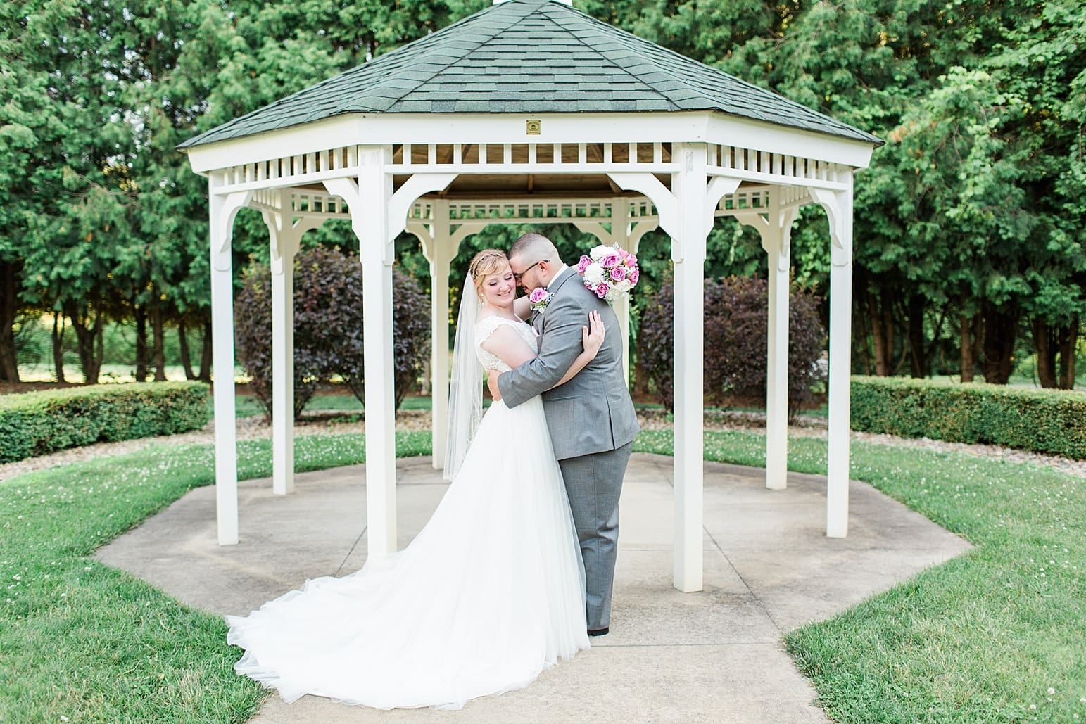 Arielle Peters Photography | Bride and groom outside under gazebo on wedding day at St. Joseph County Parks in South Bend, Indiana.