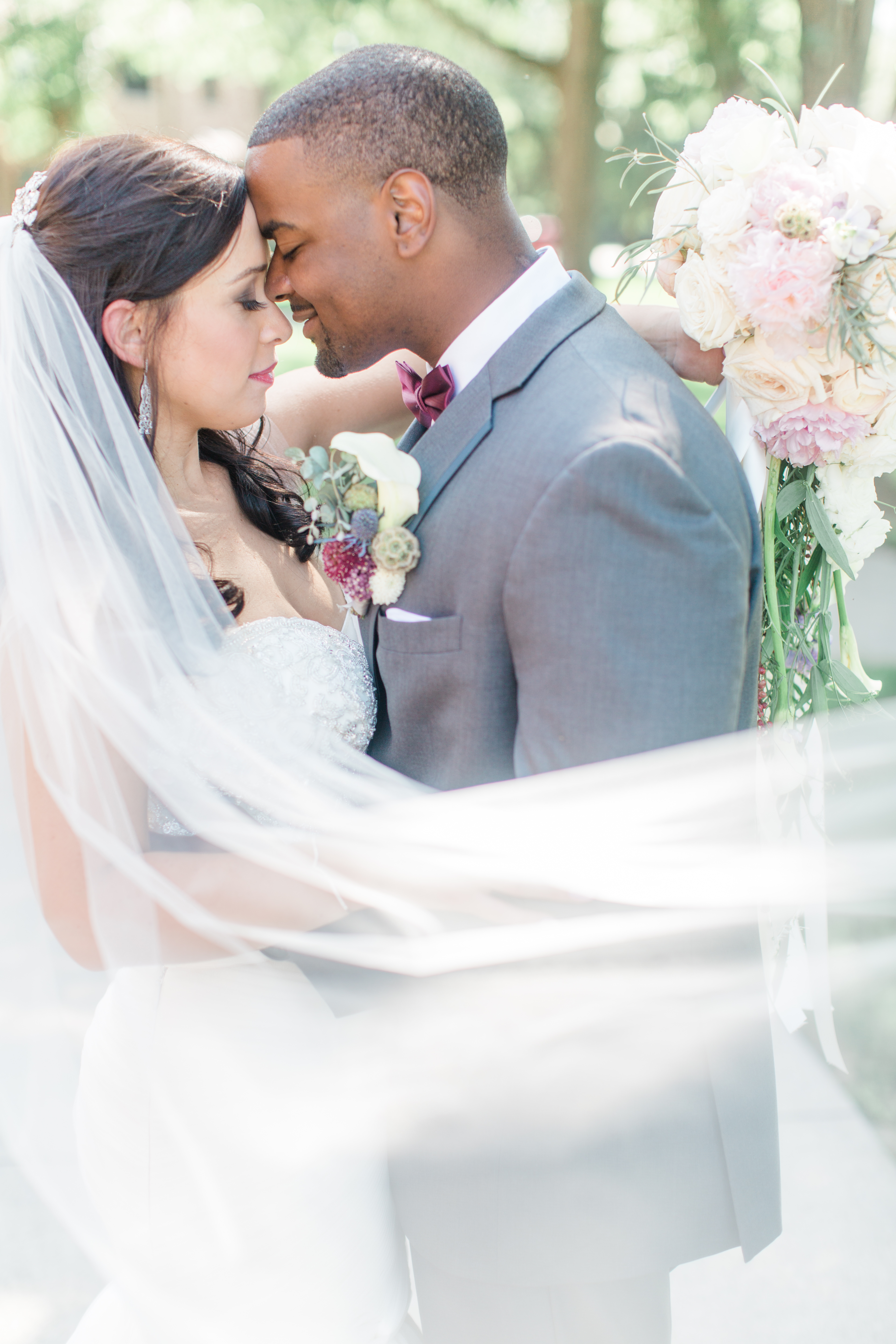Arielle Peters Photography taking a couple’s wedding day photos at Nazareth Hall in Grand Rapids, Ohio.