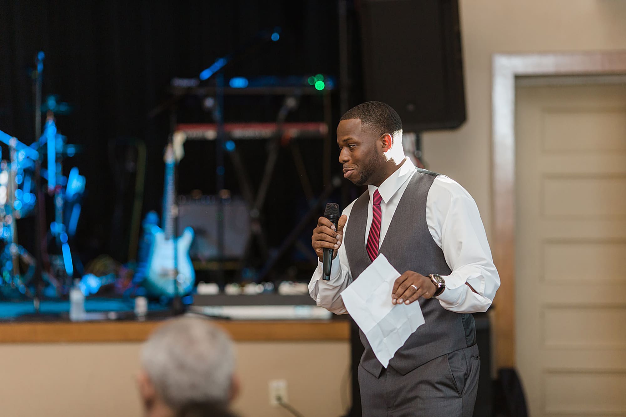Arielle Peters Photography | Best man giving speech at wedding reception on wedding day at Nazareth Hall in Grand Rapids, Ohio. 