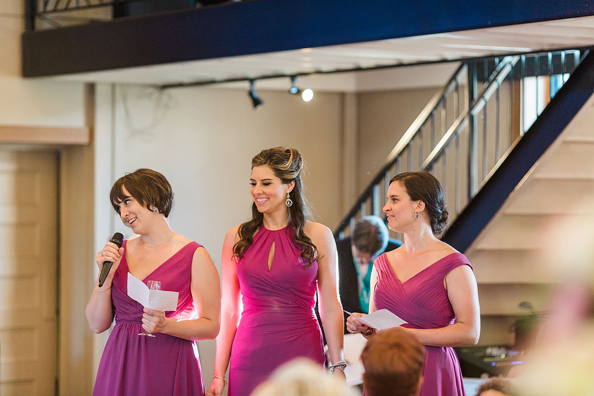 Arielle Peters Photography | Bridesmaids giving speech at wedding reception on wedding day at Nazareth Hall in Grand Rapids, Ohio. 