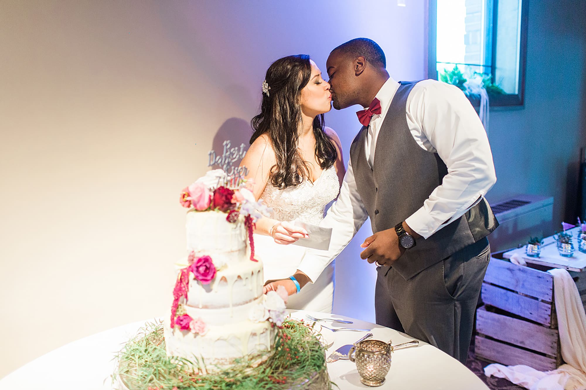 Arielle Peters Photography | Bride and groom kissing at wedding reception on wedding day at Nazareth Hall in Grand Rapids, Ohio. 