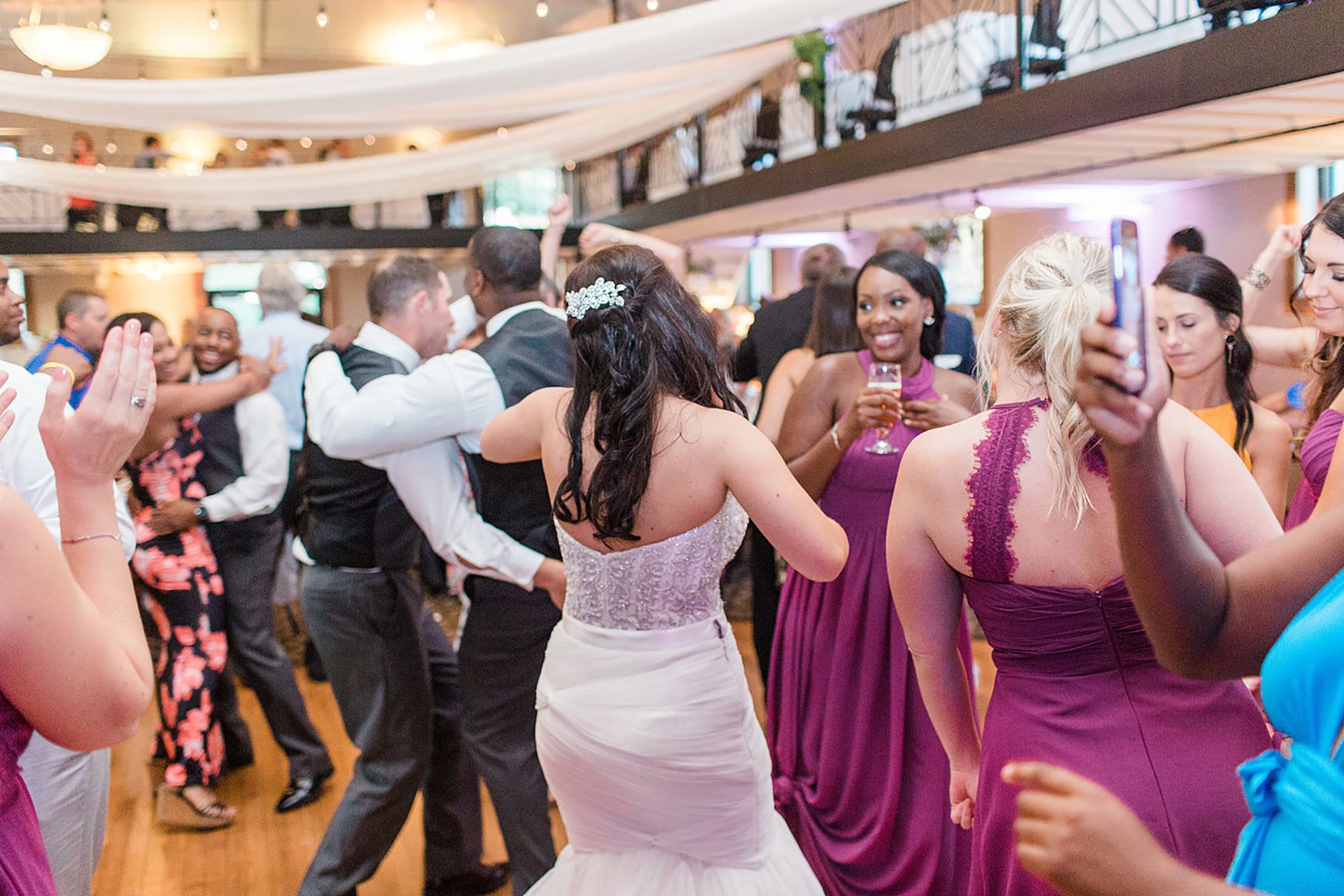 Arielle Peters Photography | Wedding guests dancing at wedding reception on wedding day at Nazareth Hall in Grand Rapids, Ohio. 