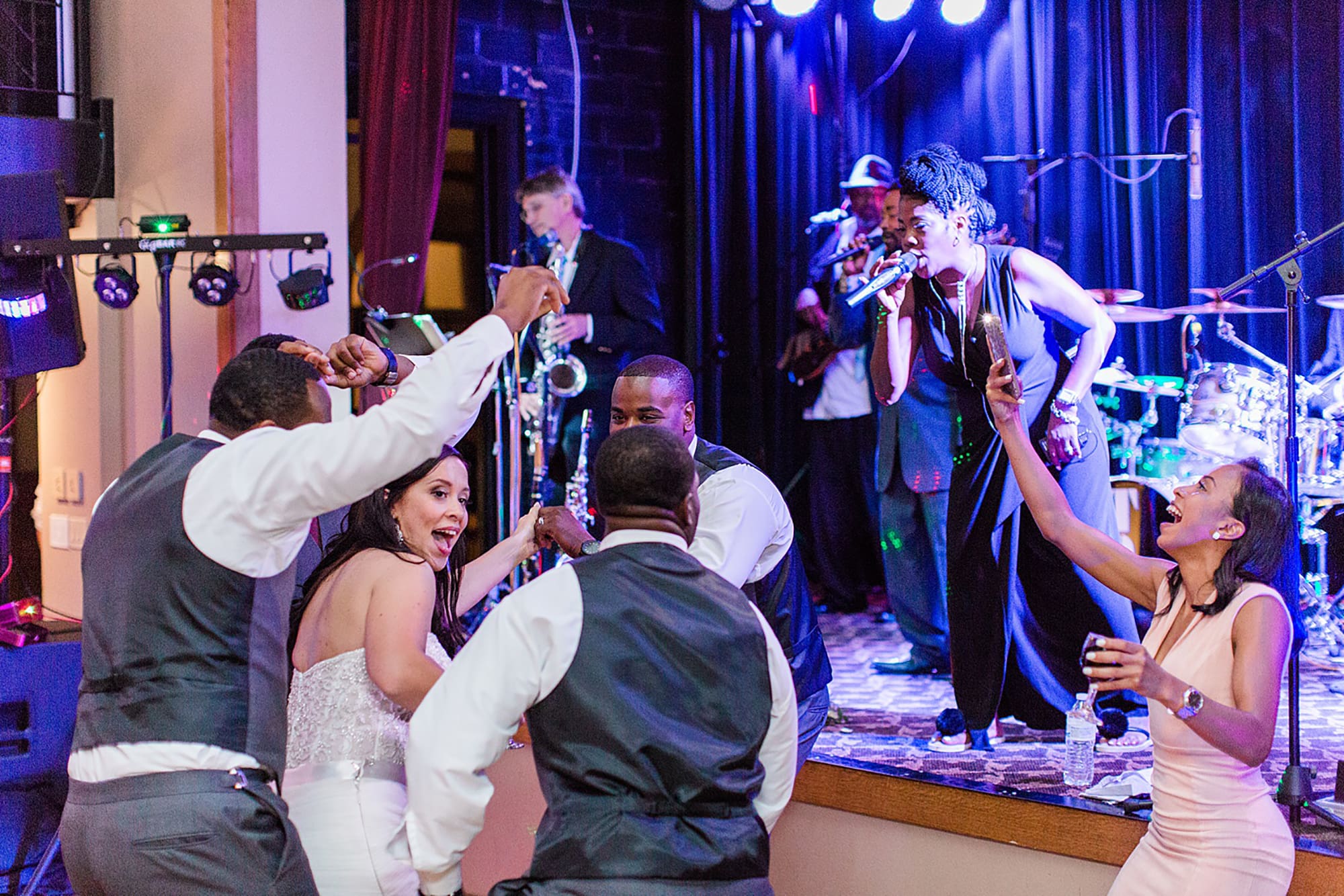 Arielle Peters Photography | Wedding guests dancing at wedding reception on wedding day at Nazareth Hall in Grand Rapids, Ohio. 