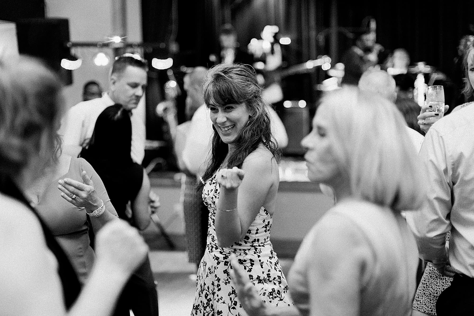 Arielle Peters Photography | Wedding guests dancing at wedding reception on wedding day at Nazareth Hall in Grand Rapids, Ohio. 