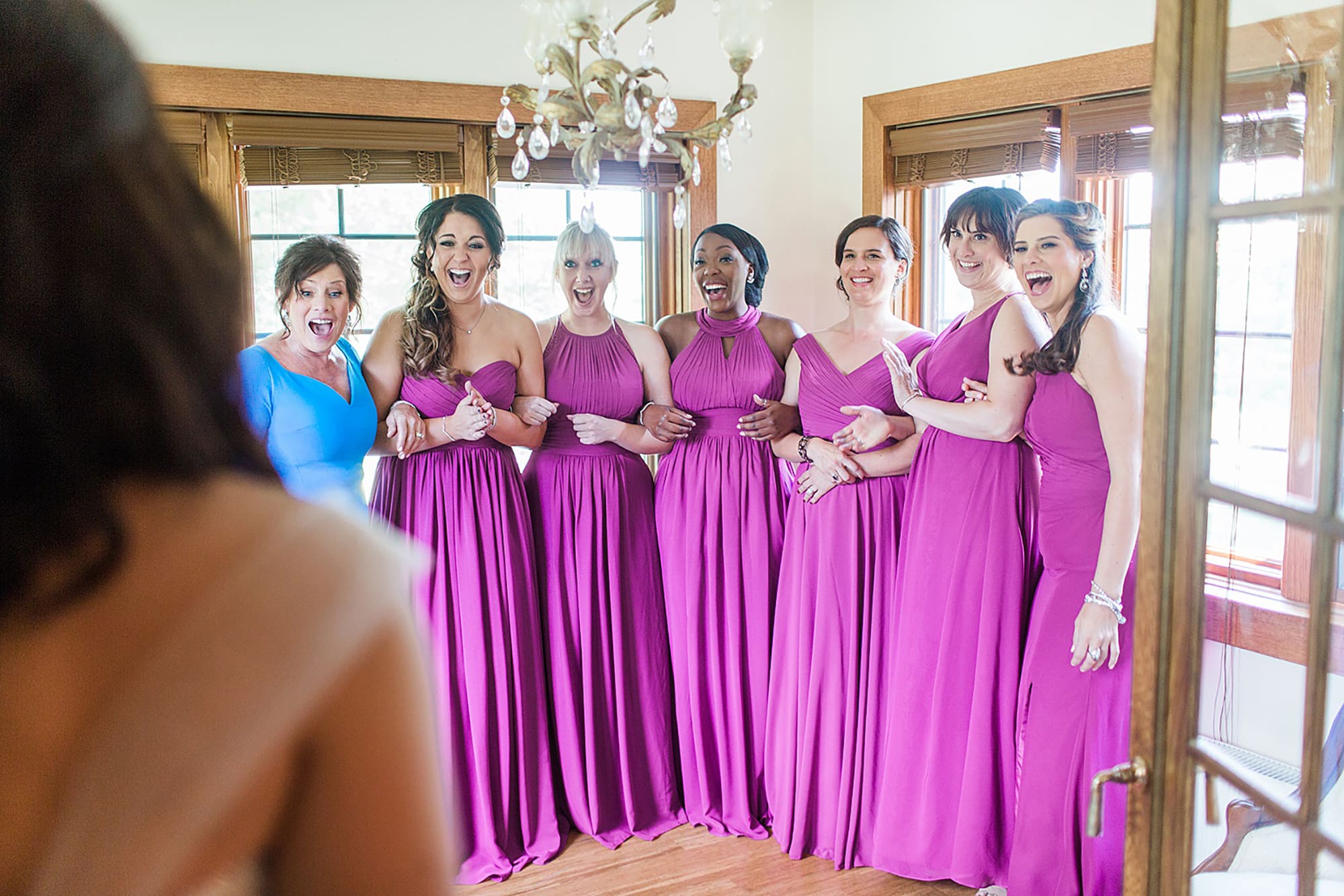Arielle Peters Photography | Bride and bridesmaids having first reveal on wedding day photos at Nazareth Hall in Grand Rapids, Ohio. 