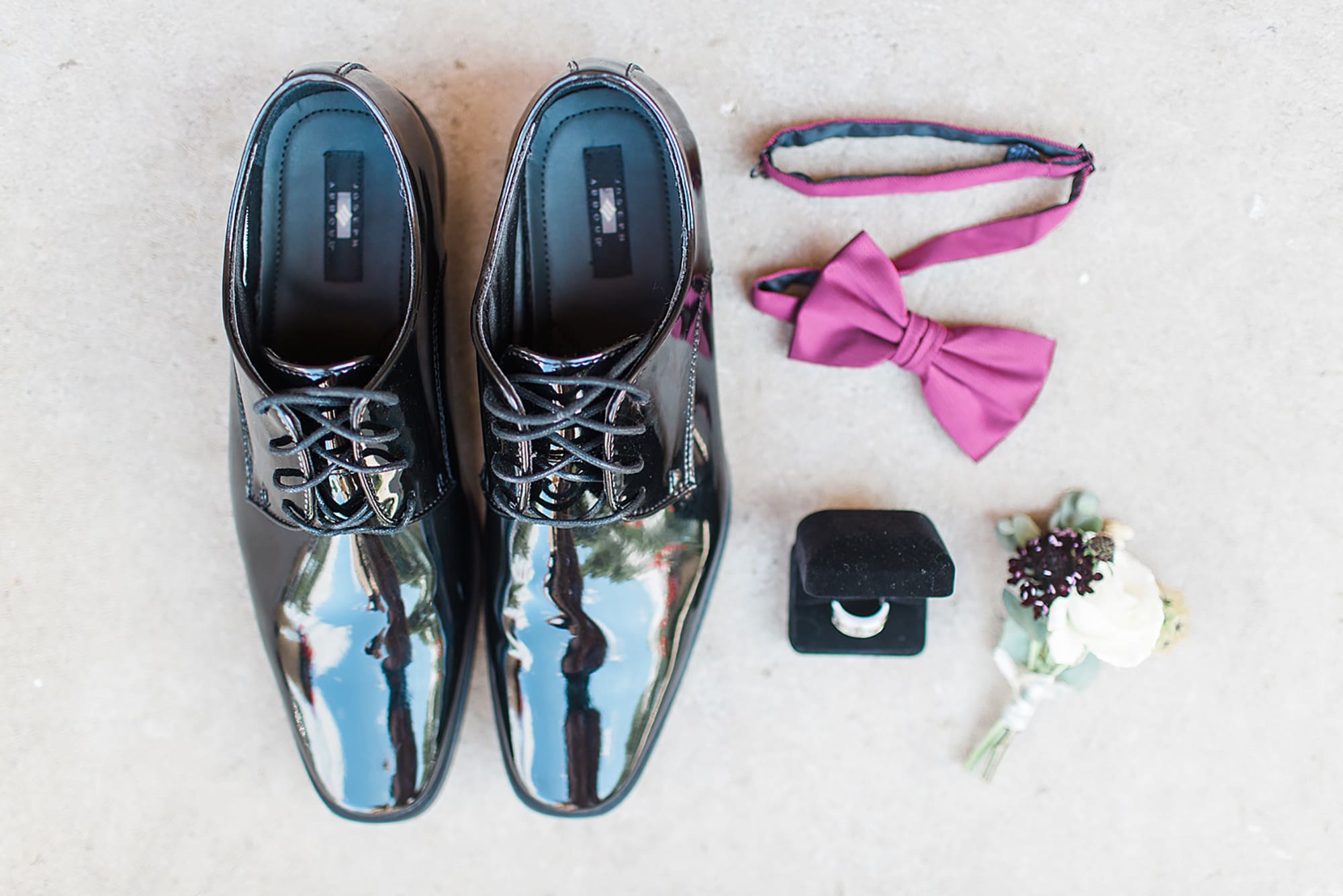 Arielle Peters Photography | Groom shoes and bowtie on wedding day photos at Nazareth Hall in Grand Rapids, Ohio. 