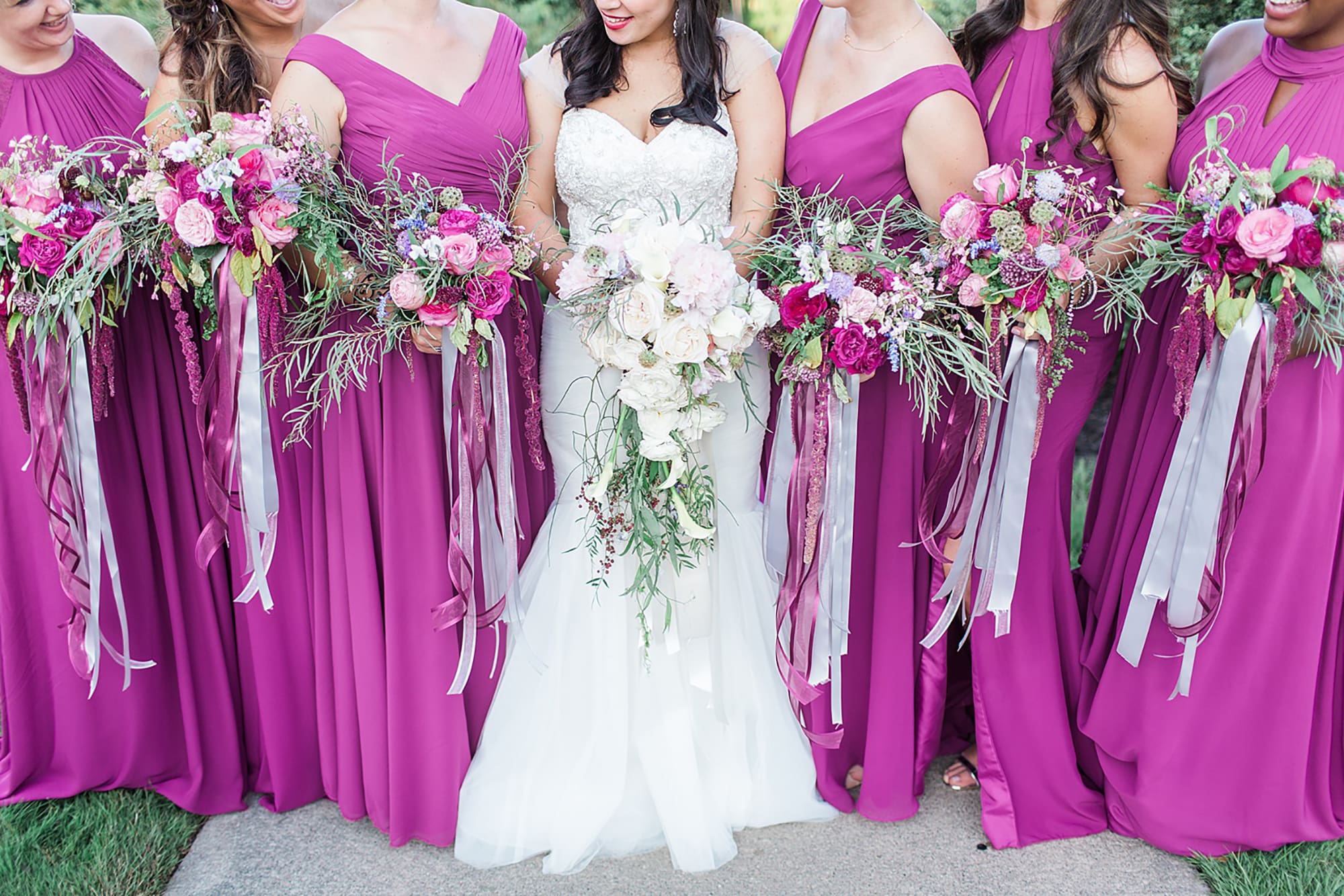 Arielle Peters Photography | Bride and bridesmaids in garden on wedding day photos at Nazareth Hall in Grand Rapids, Ohio. 