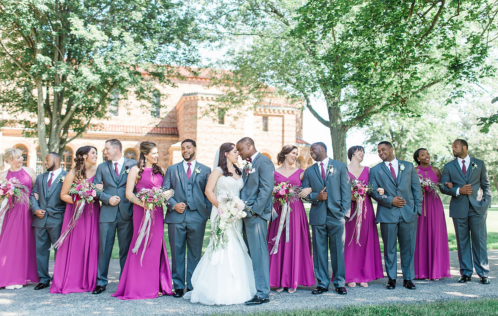 Arielle Peters Photography | Wedding party in park on wedding day photos at Nazareth Hall in Grand Rapids, Ohio. 