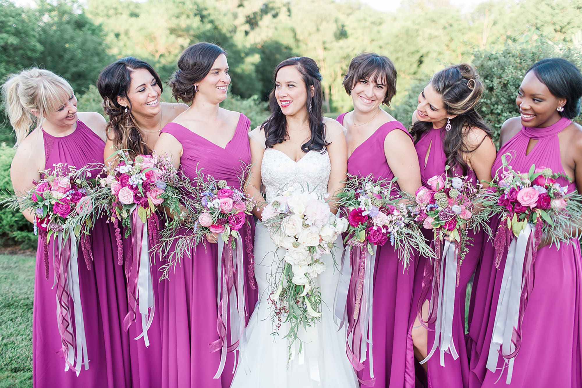 Arielle Peters Photography | Bride and bridesmaids in park on wedding day photos at Nazareth Hall in Grand Rapids, Ohio. 