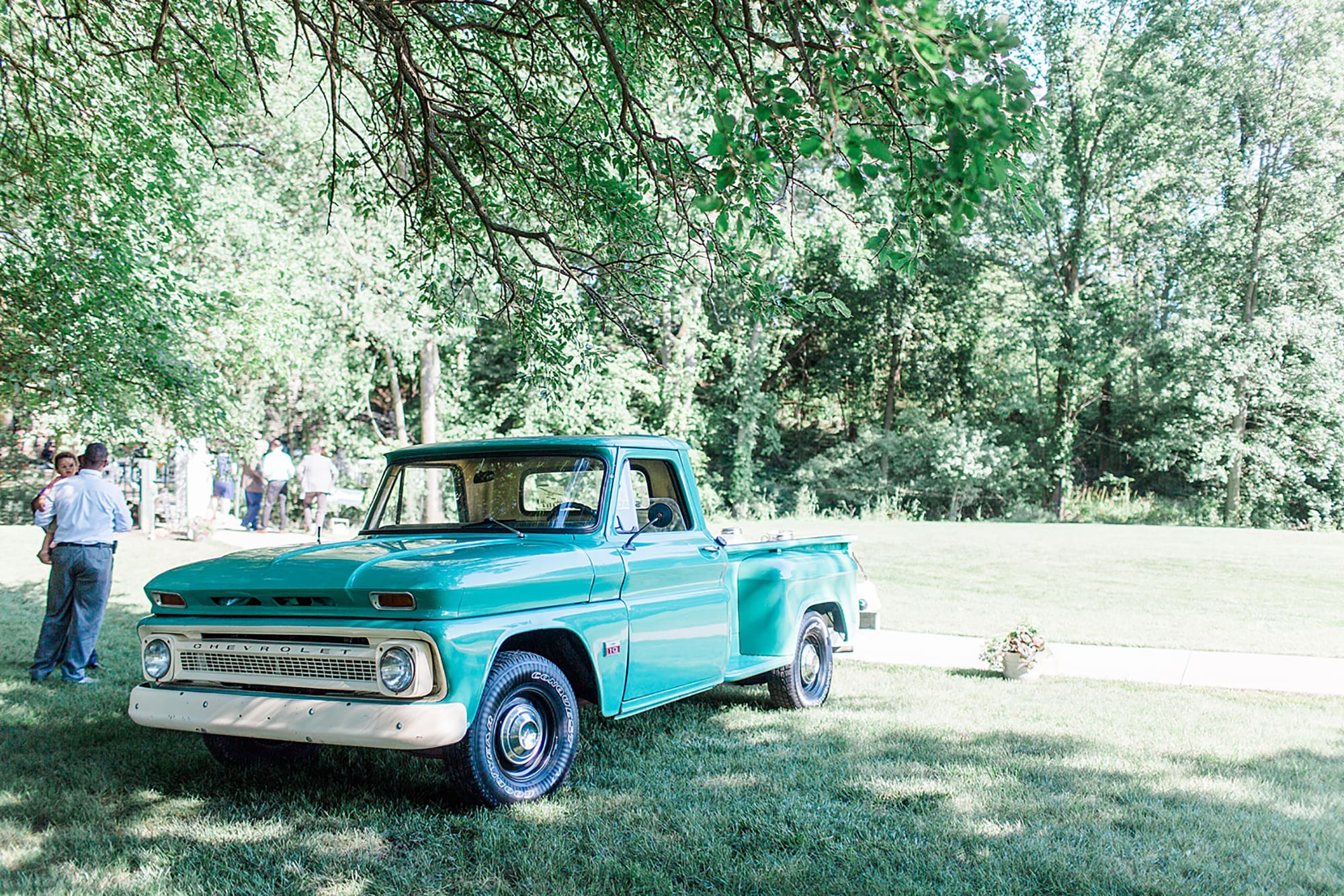 Arielle Peters Photography | Old pickup truck at outdoor wedding day photos at Nazareth Hall in Grand Rapids, Ohio. 