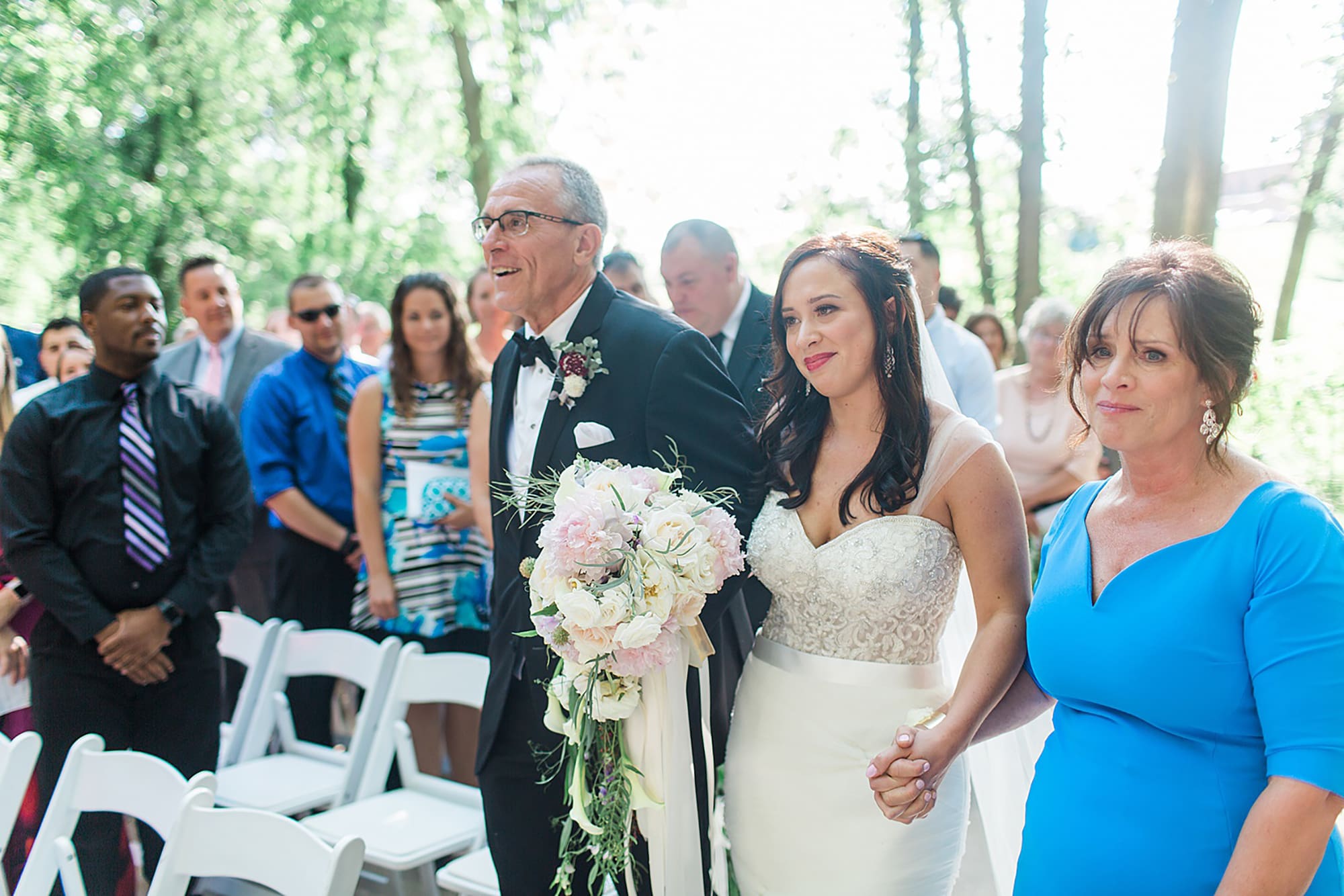 Arielle Peters Photography | Parents walking bride down the aisle on wedding day photos at Nazareth Hall in Grand Rapids, Ohio. 