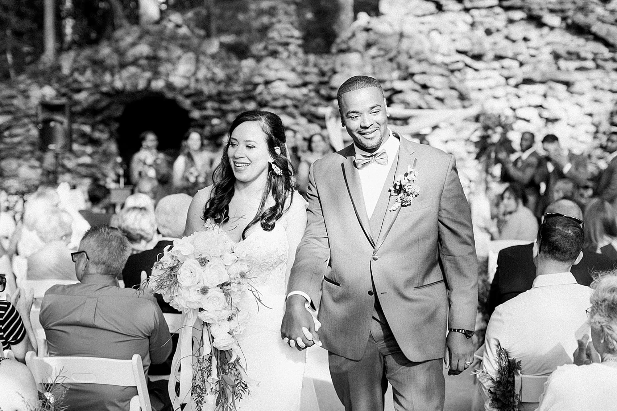 Arielle Peters Photography | Bride and groom walking down the aisle at outdoor wedding day at Nazareth Hall in Grand Rapids, Ohio. 