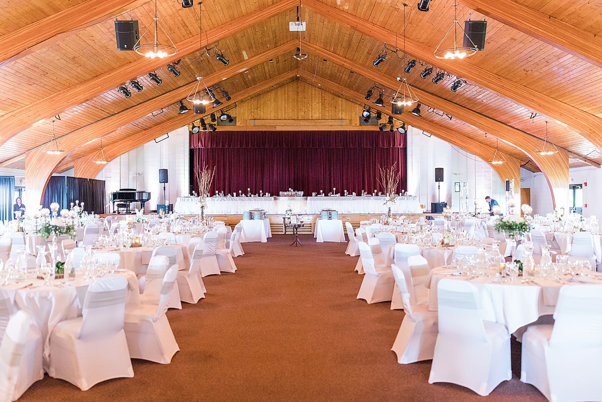 Arielle Peters Photography | Wedding reception table settings and floral arrangements on wedding day at Winona Heritage Room in Winona Lake, Indiana.