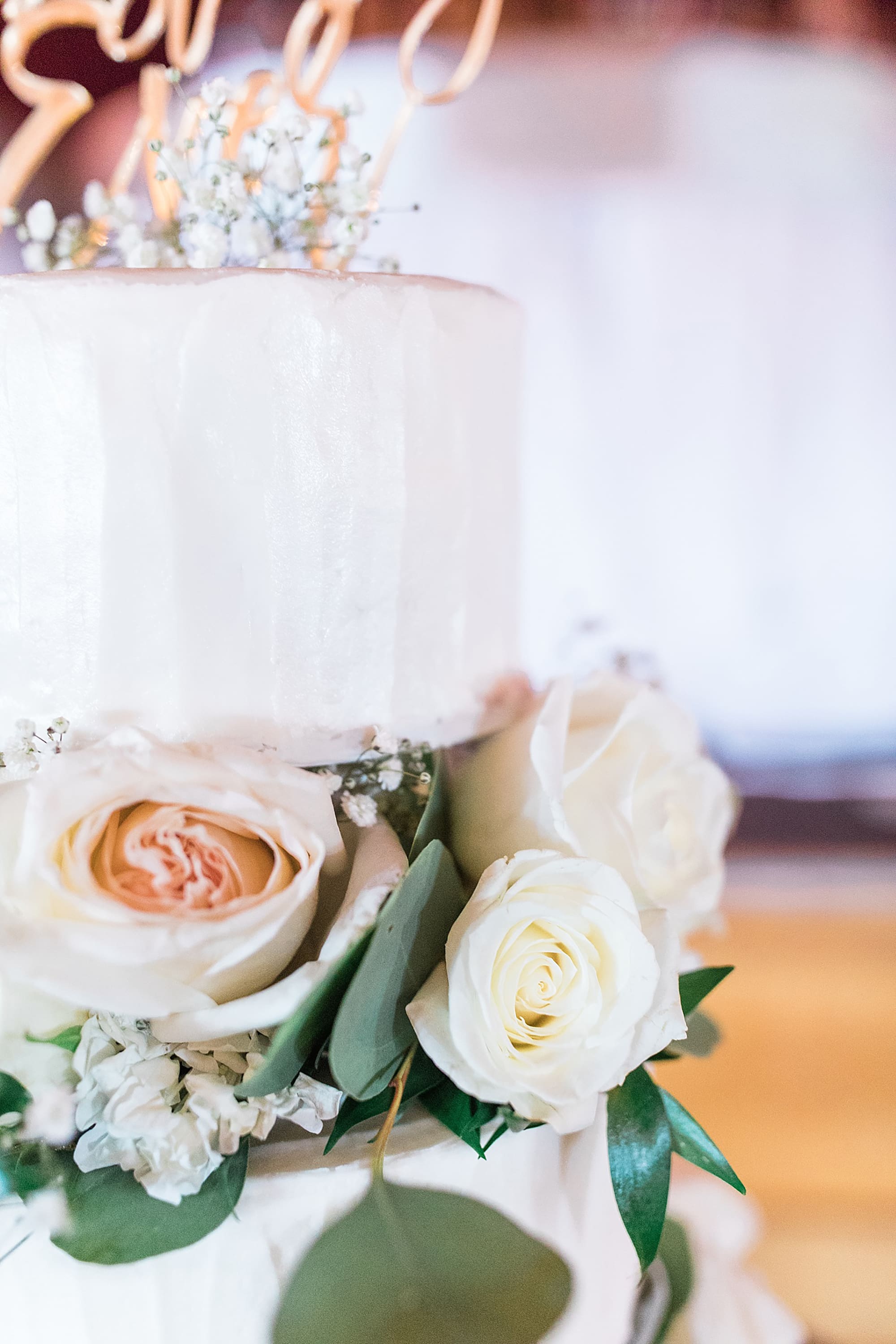 Arielle Peters Photography | Wedding reception table settings and floral arrangements on wedding day at Winona Heritage Room in Winona Lake, Indiana.