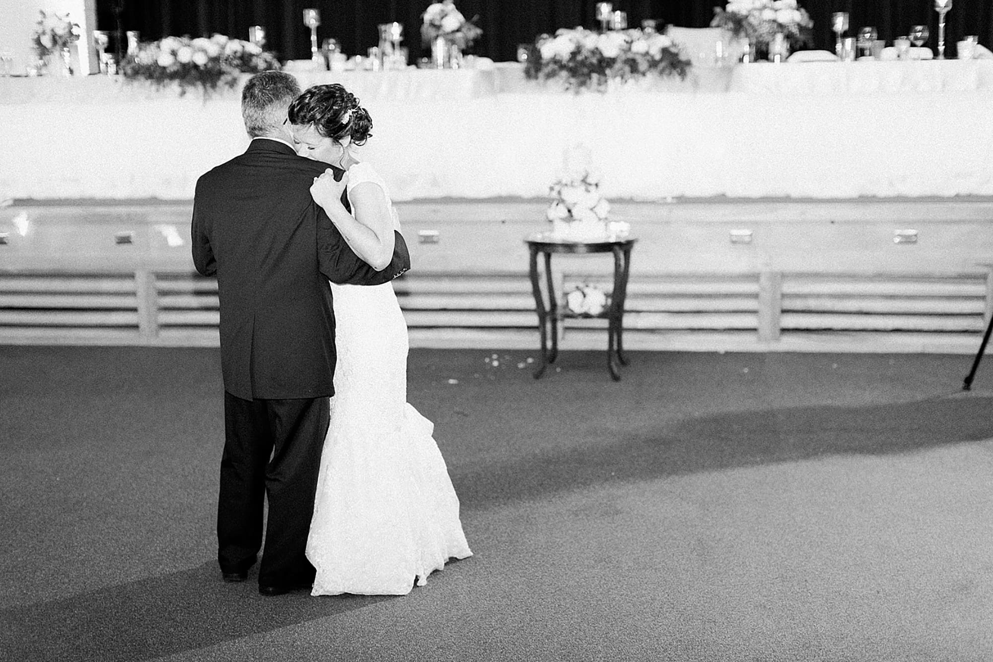 Arielle Peters Photography | Bride and groom sharing first dance on wedding day at Winona Heritage Room in Winona Lake, Indiana.