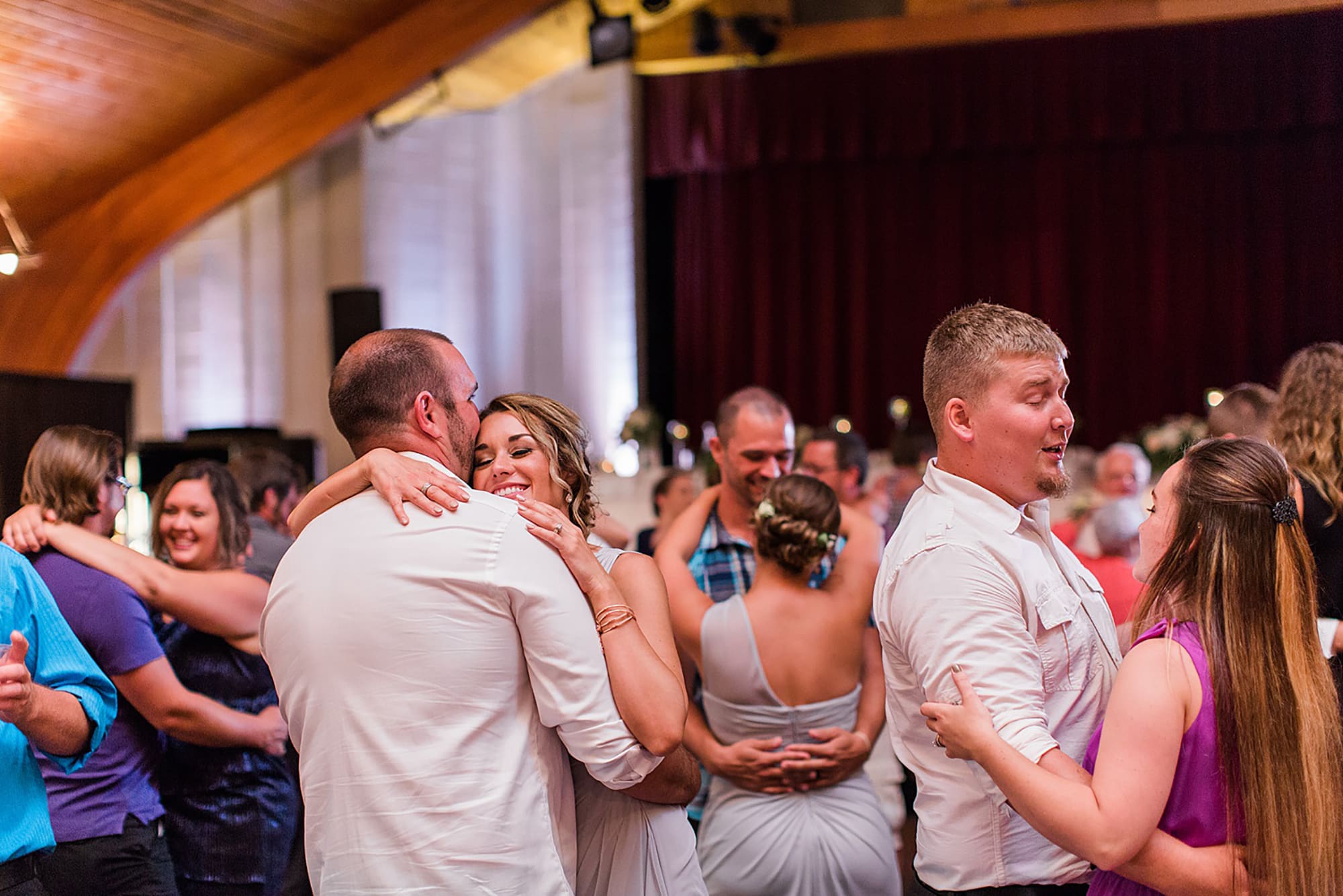 Arielle Peters Photography | Wedding guests dancing on wedding day at Winona Heritage Room in Winona Lake, Indiana.