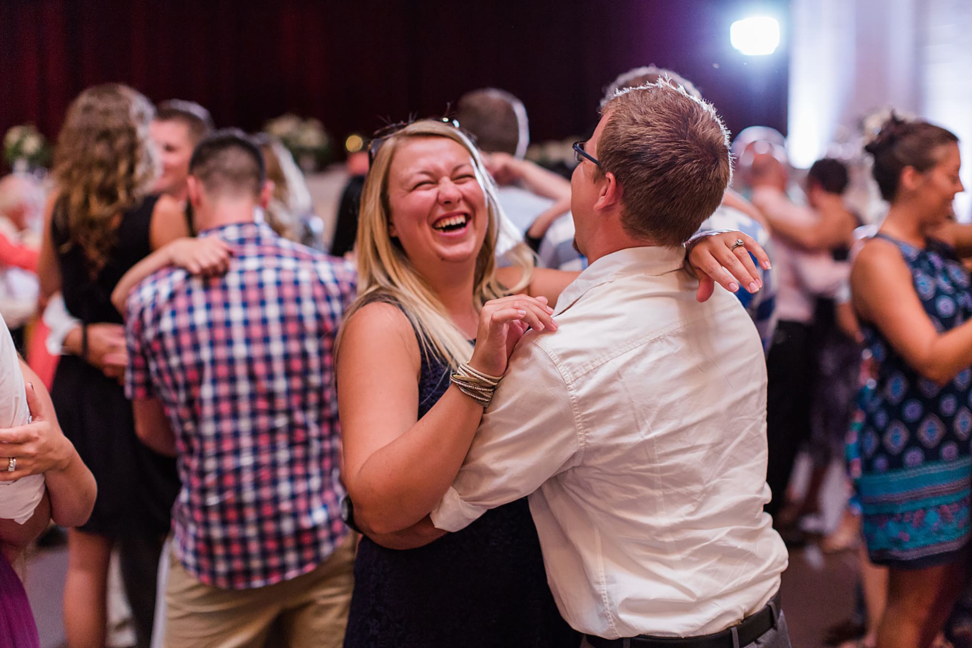 Arielle Peters Photography | Wedding guests dancing on wedding day at Winona Heritage Room in Winona Lake, Indiana.