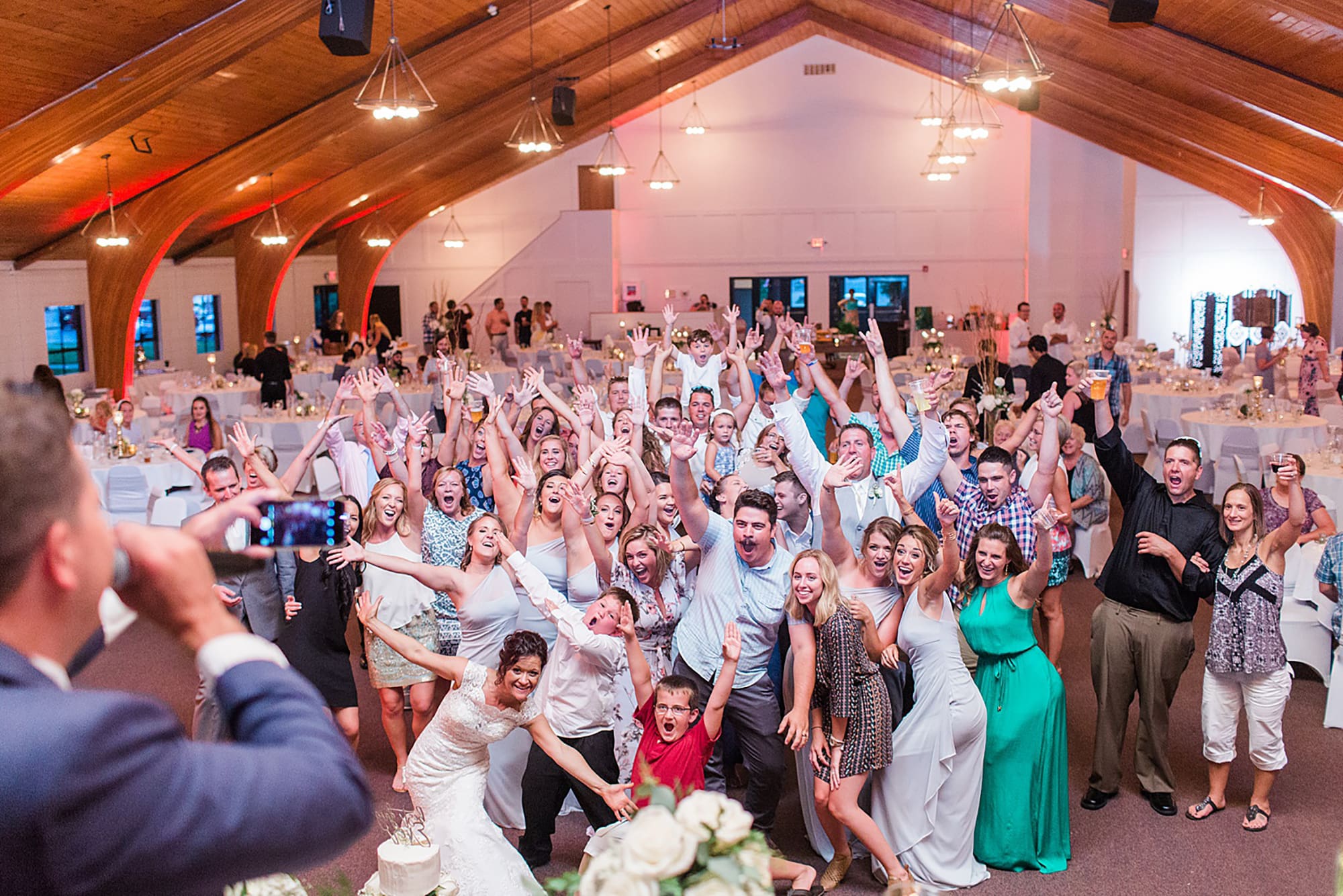 Arielle Peters Photography | Wedding guests taking a selfie on wedding day at Winona Heritage Room in Winona Lake, Indiana.