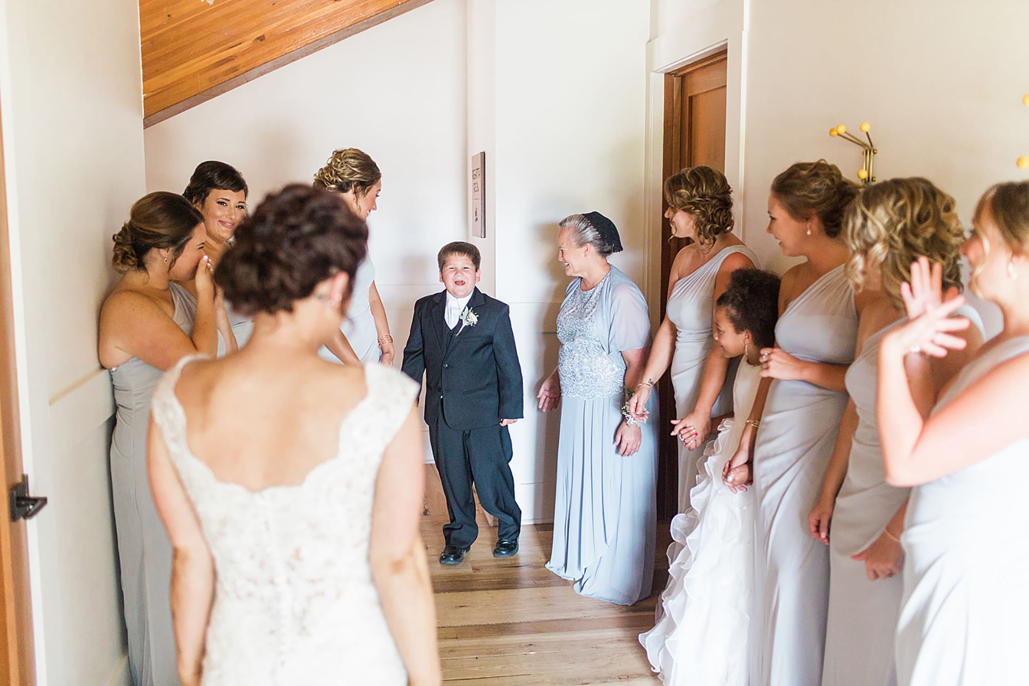Arielle Peters Photography | Bride and young son having first reveal on wedding day at Winona Heritage Room in Winona Lake, Indiana.