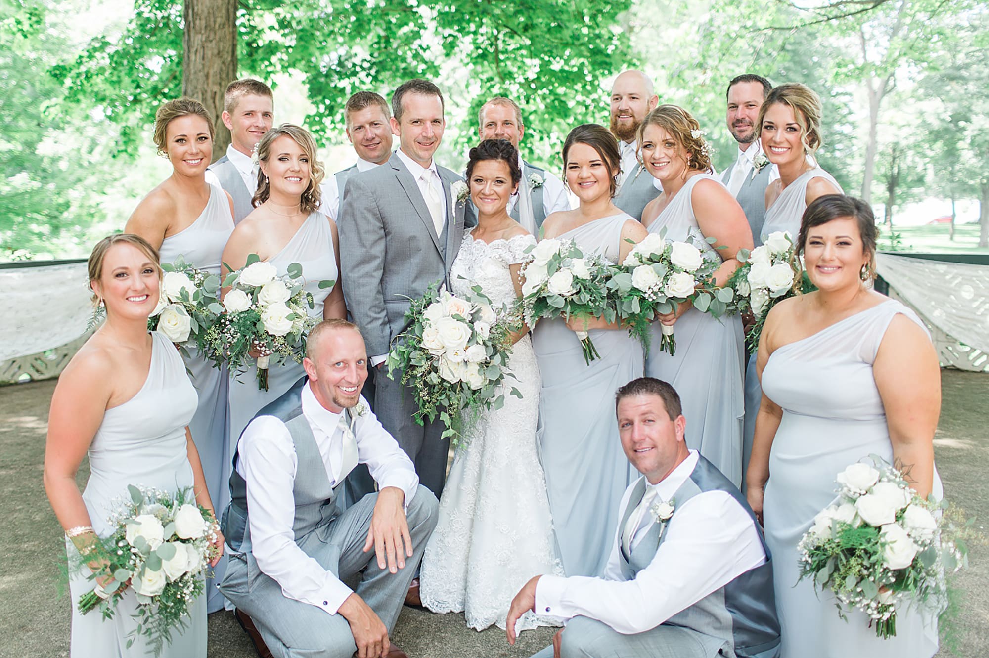 Arielle Peters Photography | Bride and bridesmaids in park on wedding day at Winona Heritage Room in Winona Lake, Indiana.