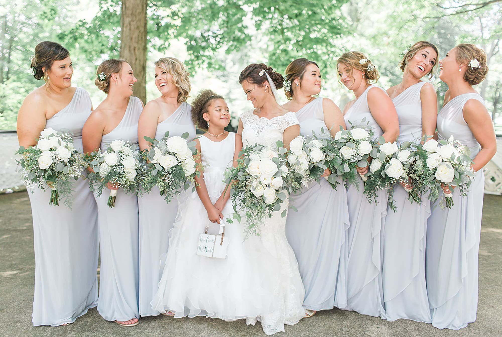 Arielle Peters Photography | Bride and bridesmaids in park on wedding day at Winona Heritage Room in Winona Lake, Indiana.