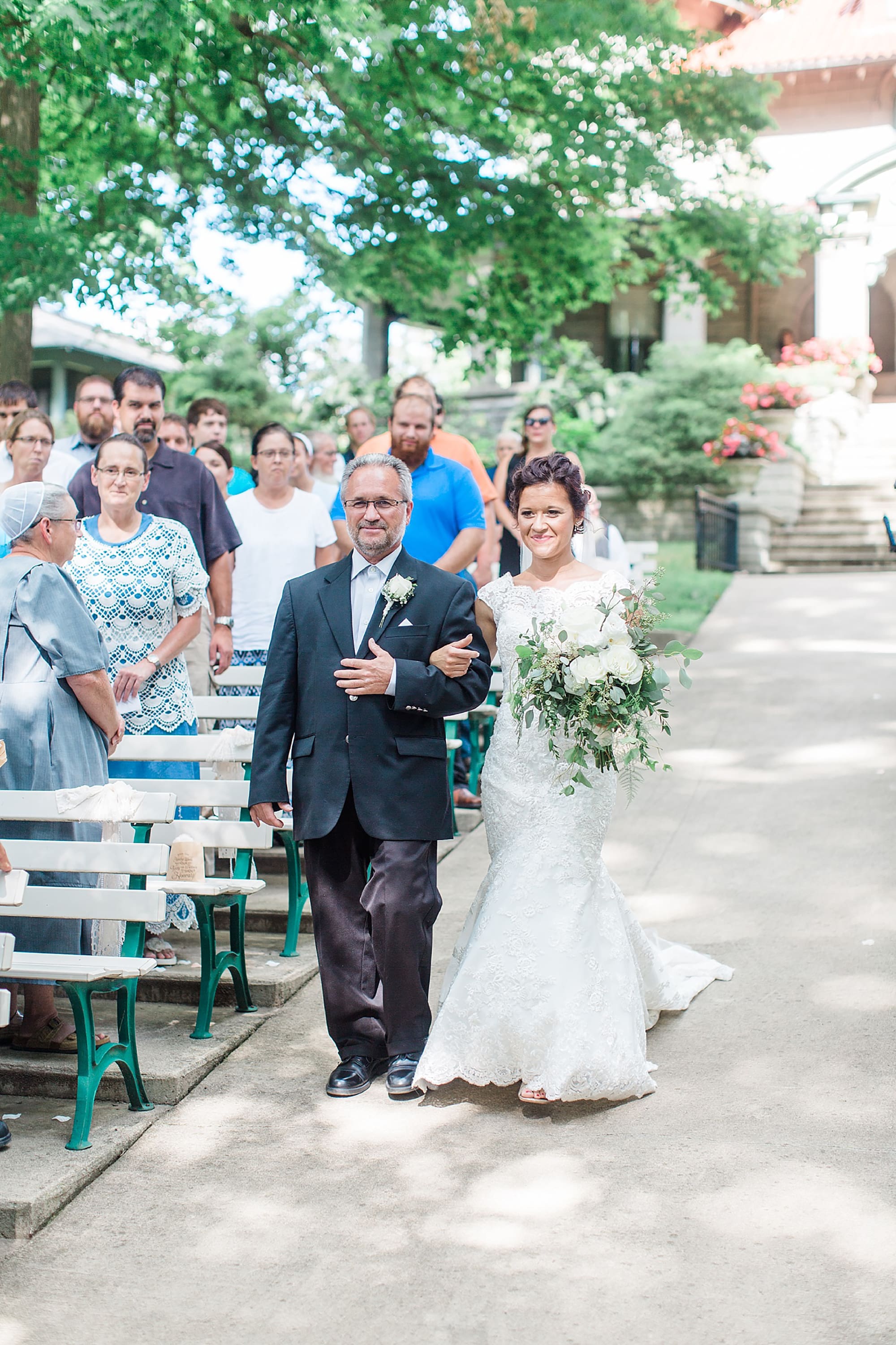 Arielle Peters Photography | Father of bride walking bride down the aisle on wedding day at Winona Heritage Room in Winona Lake, Indiana.