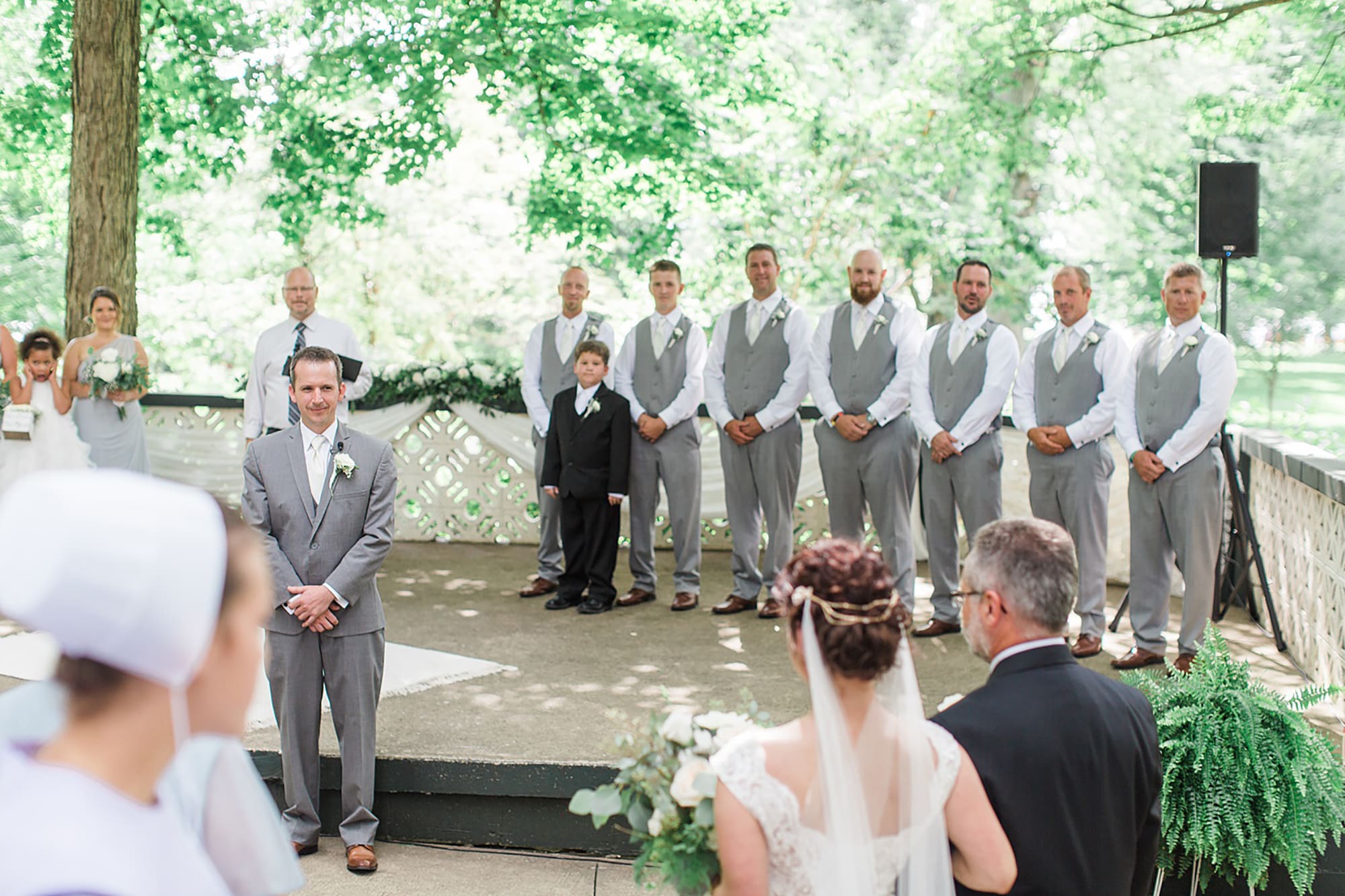 Arielle Peters Photography | Father of bride walking bride down the aisle on wedding day at Winona Heritage Room in Winona Lake, Indiana.