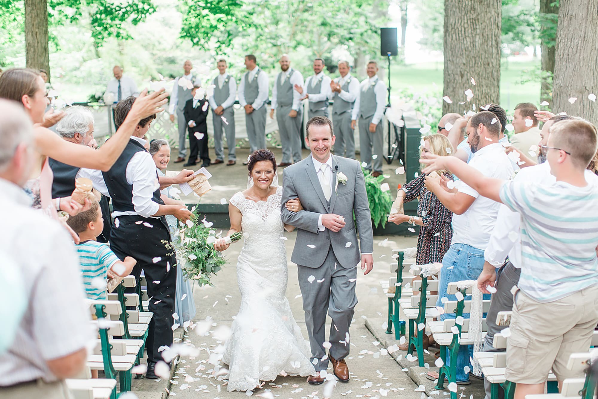 Arielle Peters Photography | Bride and groom walking down the aisle on wedding day at Winona Heritage Room in Winona Lake, Indiana.