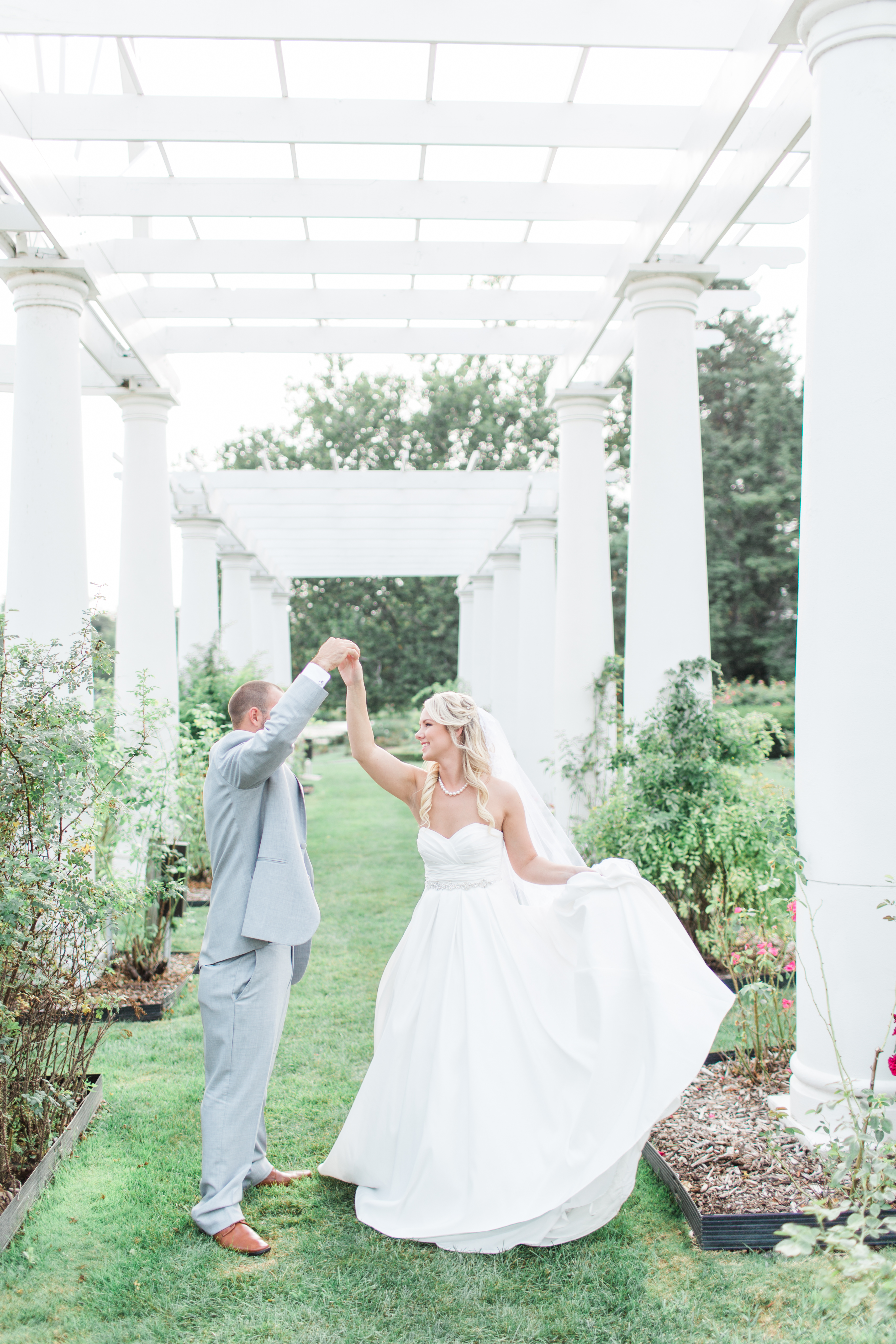 Arielle Peters Photography taking a couple’s wedding day photos at The Freemasons Hall in Fort Wayne, Indiana.