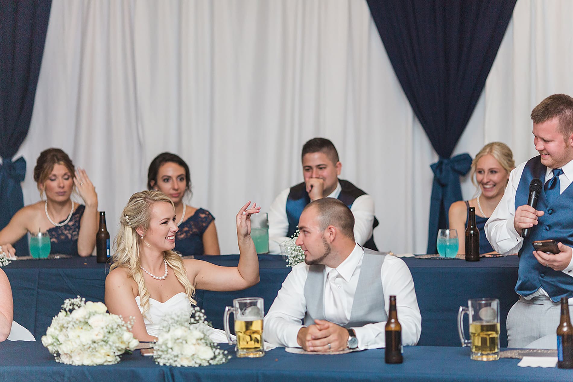 Arielle Peters Photography | Best man giving speech at wedding reception on wedding day at the Freemasons Hall in Fort Wayne, Indiana.