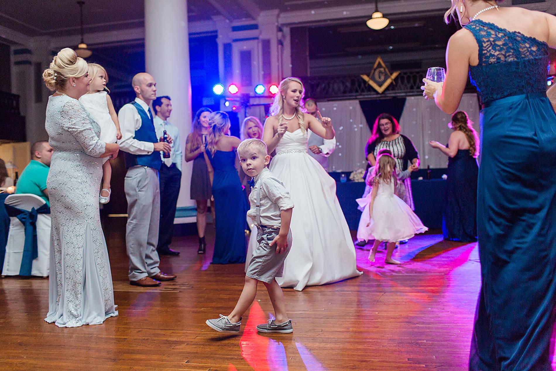 Arielle Peters Photography | Wedding guests dancing at reception on wedding day at the Freemasons Hall in Fort Wayne, Indiana.