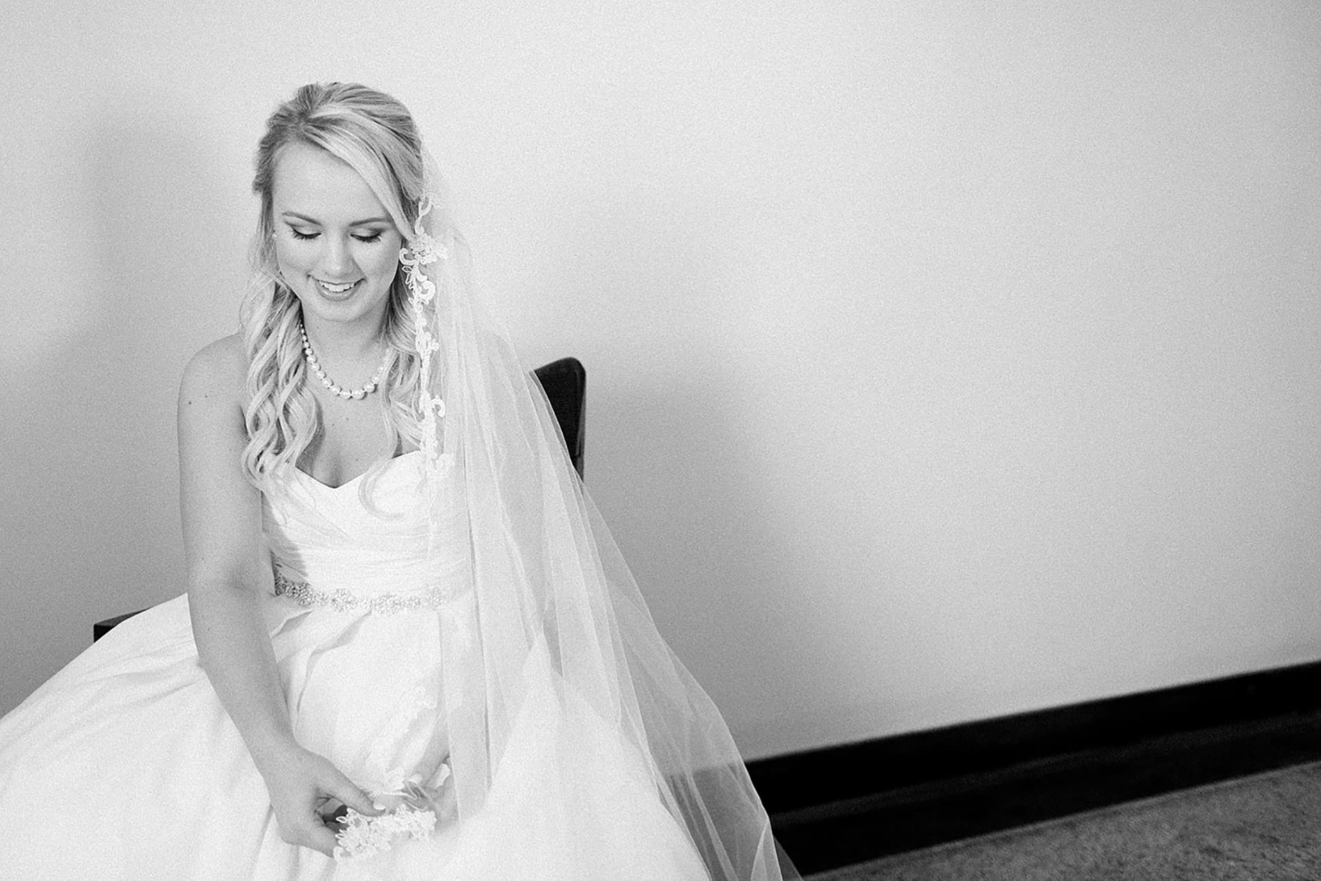 Arielle Peters Photography | Bride getting ready on wedding day at the Freemasons Hall in Fort Wayne, Indiana.