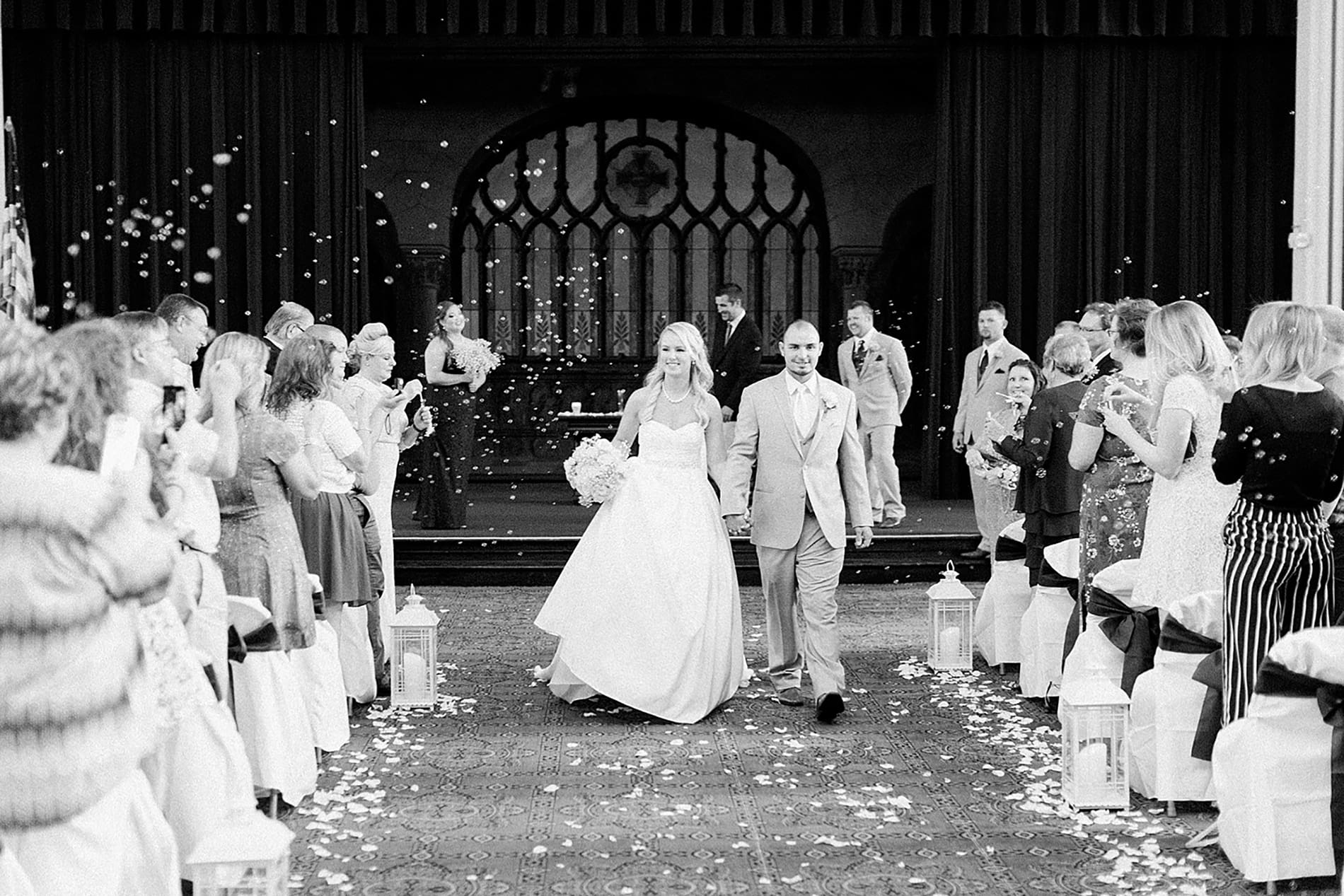 Arielle Peters Photography | Bride and groom walking down the aisle on wedding day at the Freemasons Hall in Fort Wayne, Indiana.