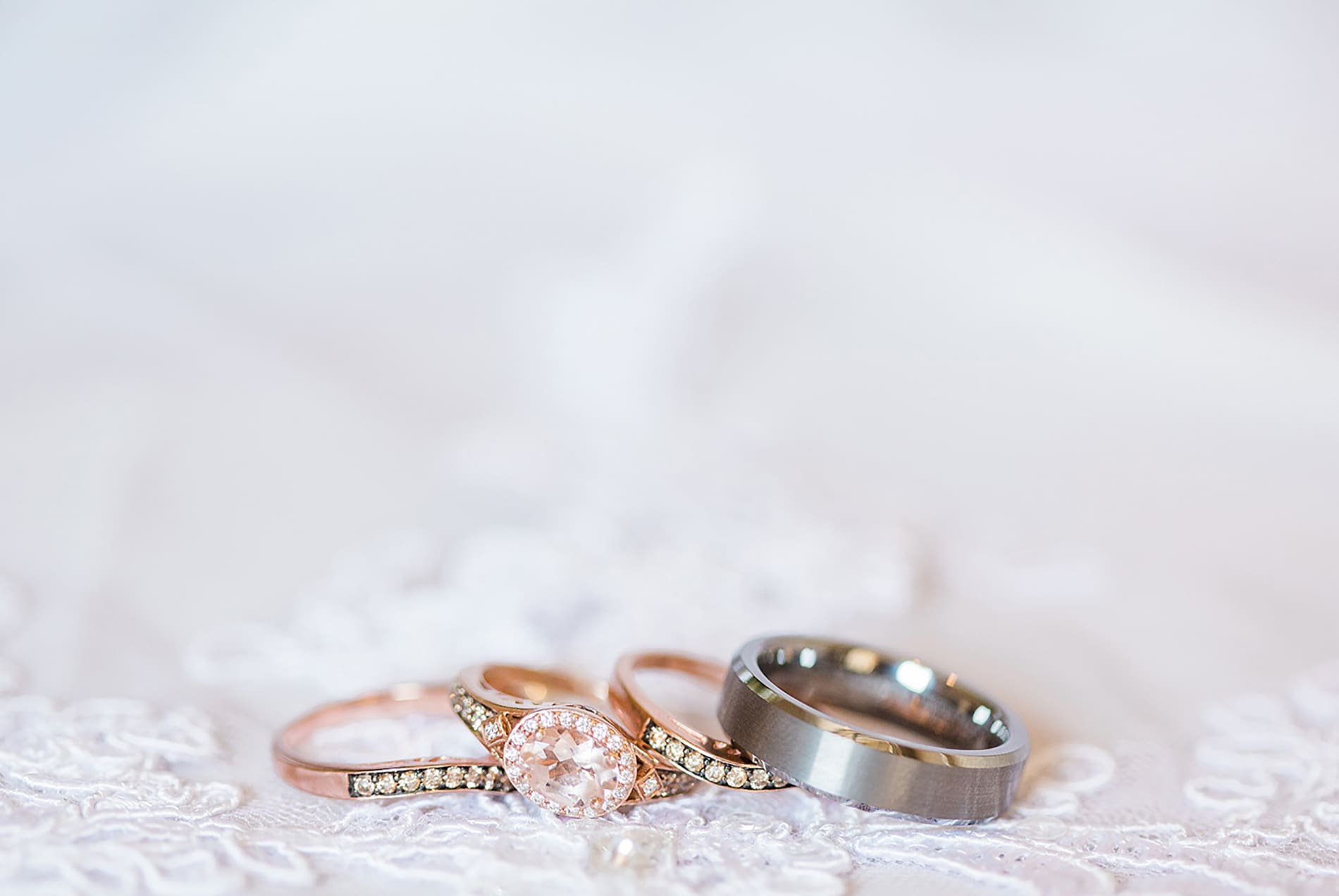 Arielle Peters Photography | Wedding rings on lace dress on wedding day at the Freemasons Hall in Fort Wayne, Indiana.