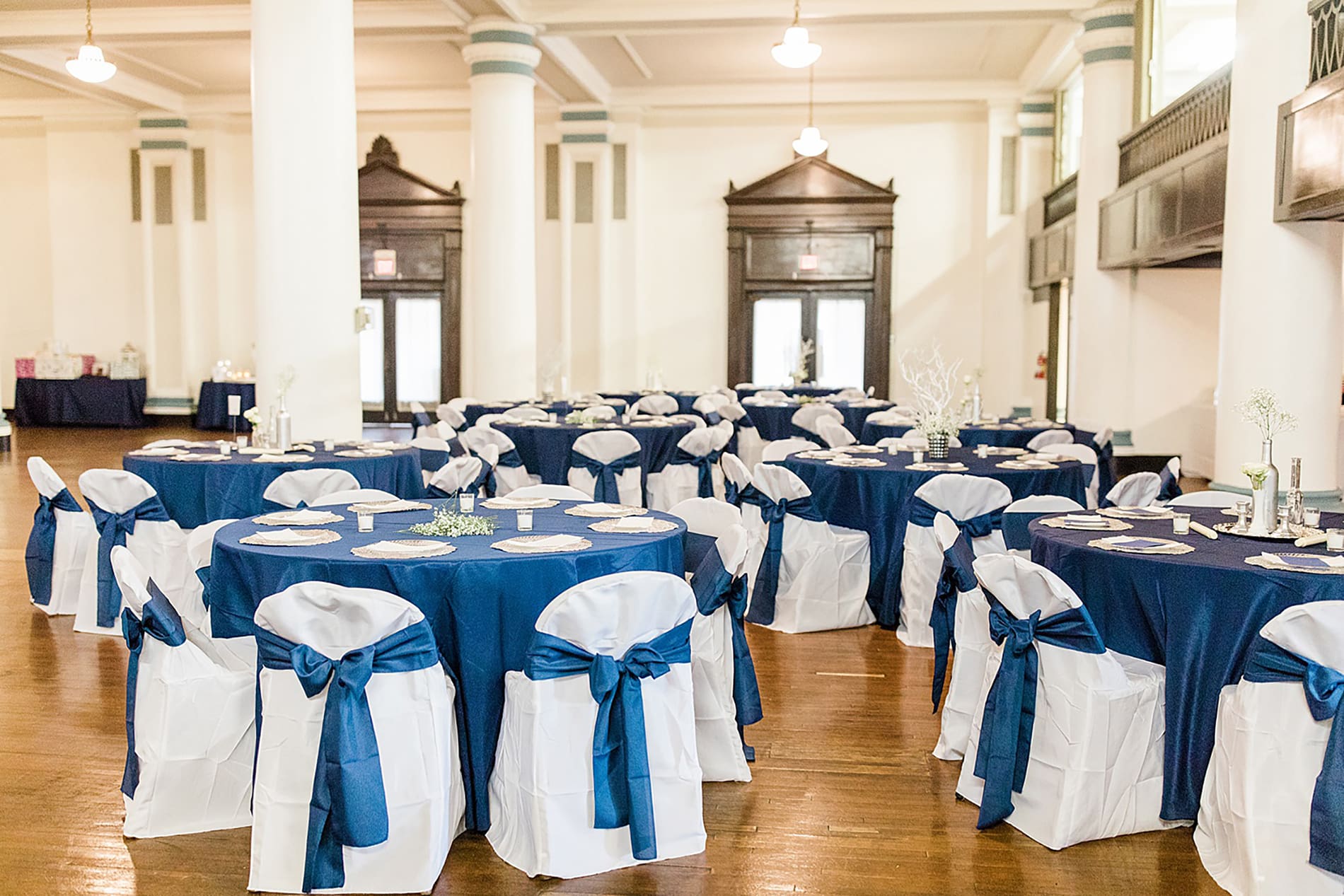 Arielle Peters Photography | Wedding reception table settings and floral arrangements on wedding day at the Freemasons Hall in Fort Wayne, Indiana.