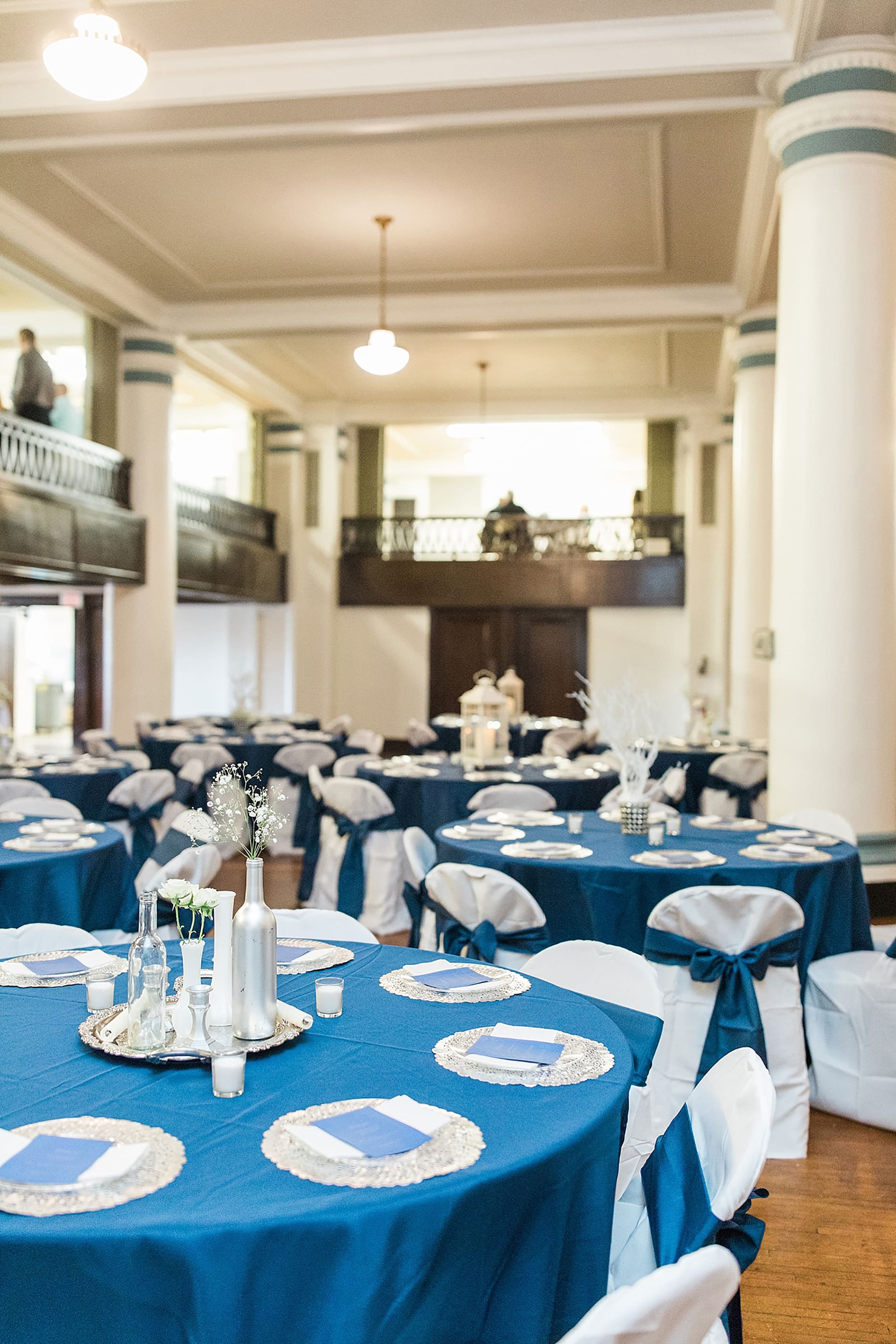 Arielle Peters Photography | Wedding reception table settings and floral arrangements on wedding day at the Freemasons Hall in Fort Wayne, Indiana.