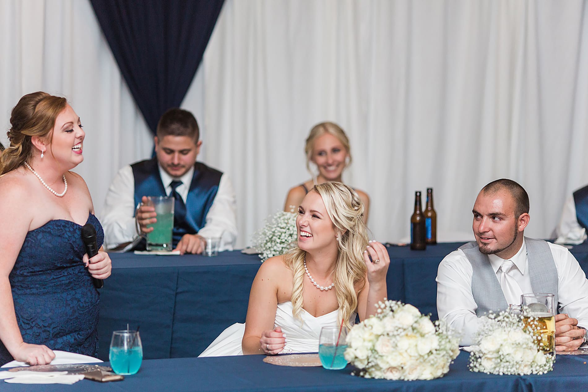 Arielle Peters Photography | Maid of honor giving speech at wedding reception on wedding day at the Freemasons Hall in Fort Wayne, Indiana.