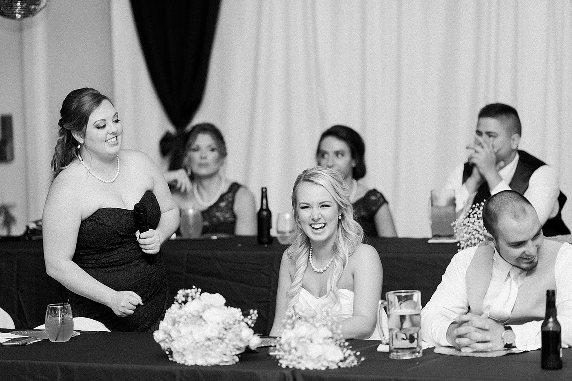 Arielle Peters Photography | Maid of honor giving speech at wedding reception on wedding day at the Freemasons Hall in Fort Wayne, Indiana.