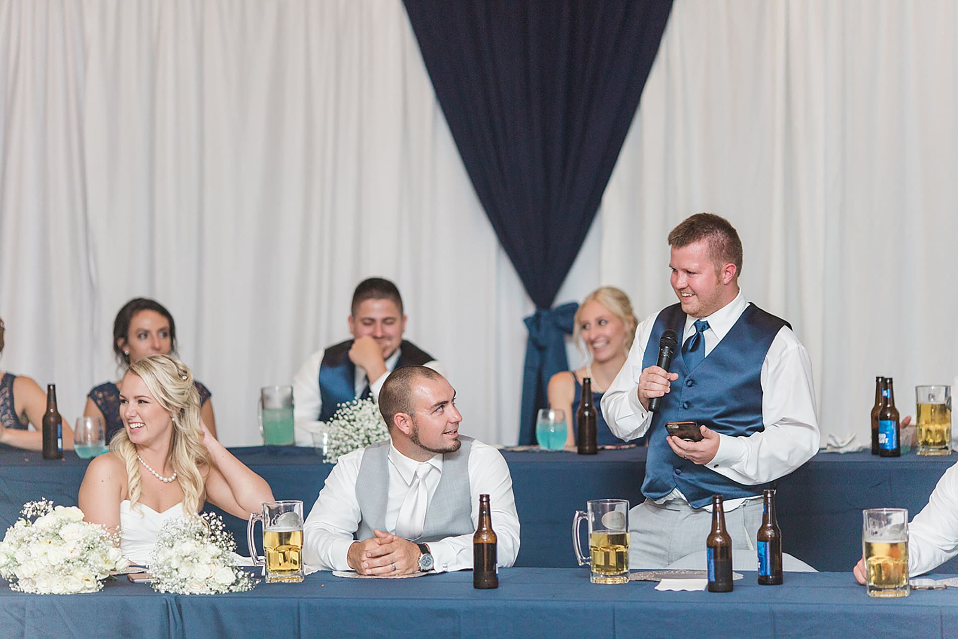 Arielle Peters Photography | Best man giving speech at wedding reception on wedding day at the Freemasons Hall in Fort Wayne, Indiana.