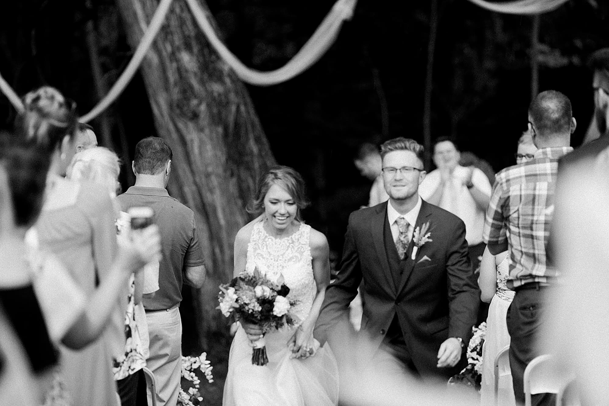 Arielle Peters Photography | Groom and bride walking down the aisle at outdoor wedding at Willowfield Lavender Farm in Mooresville, Indiana. 